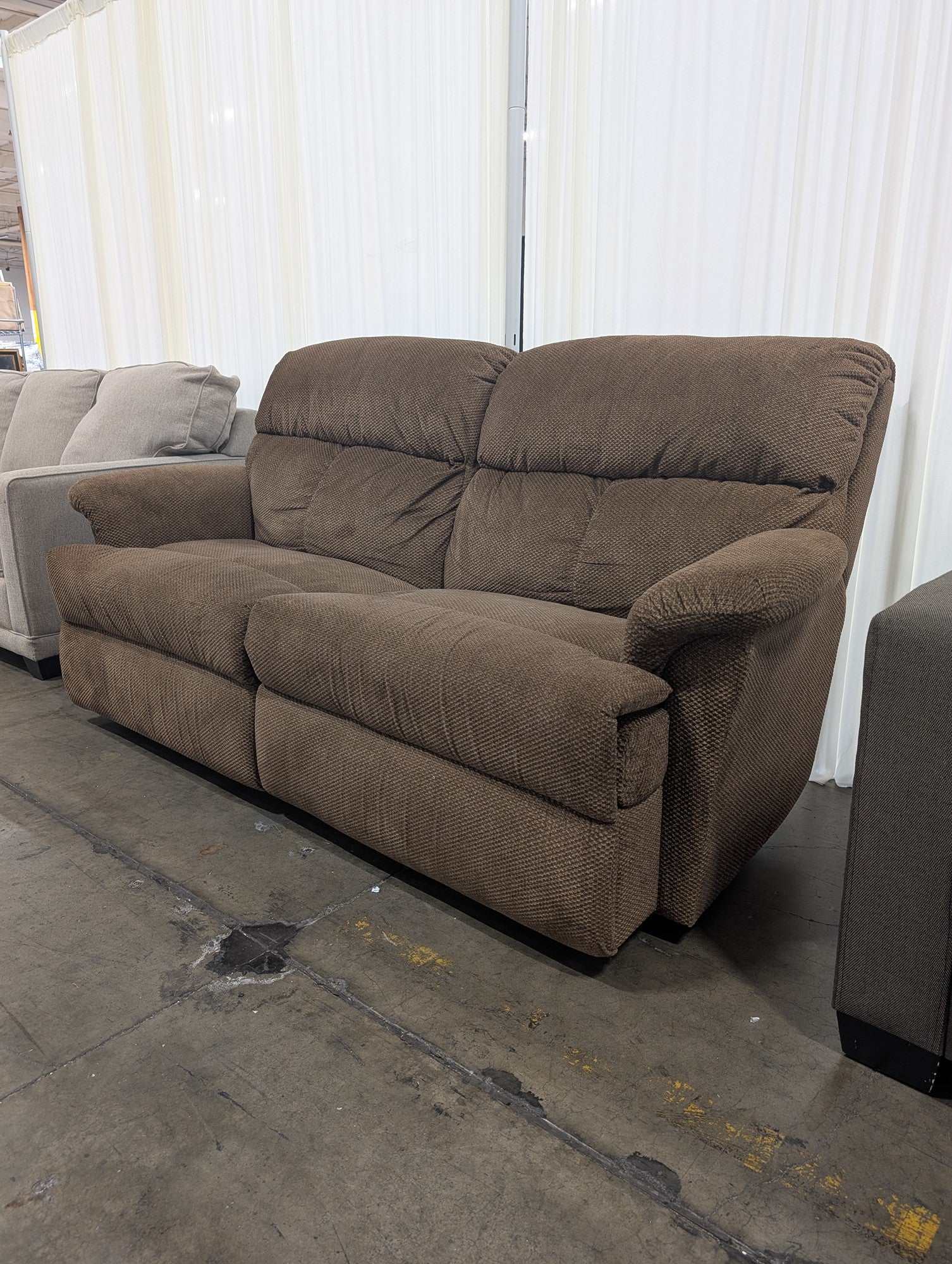 Brown Textured Fabric Reclining Couch with Padded Arms