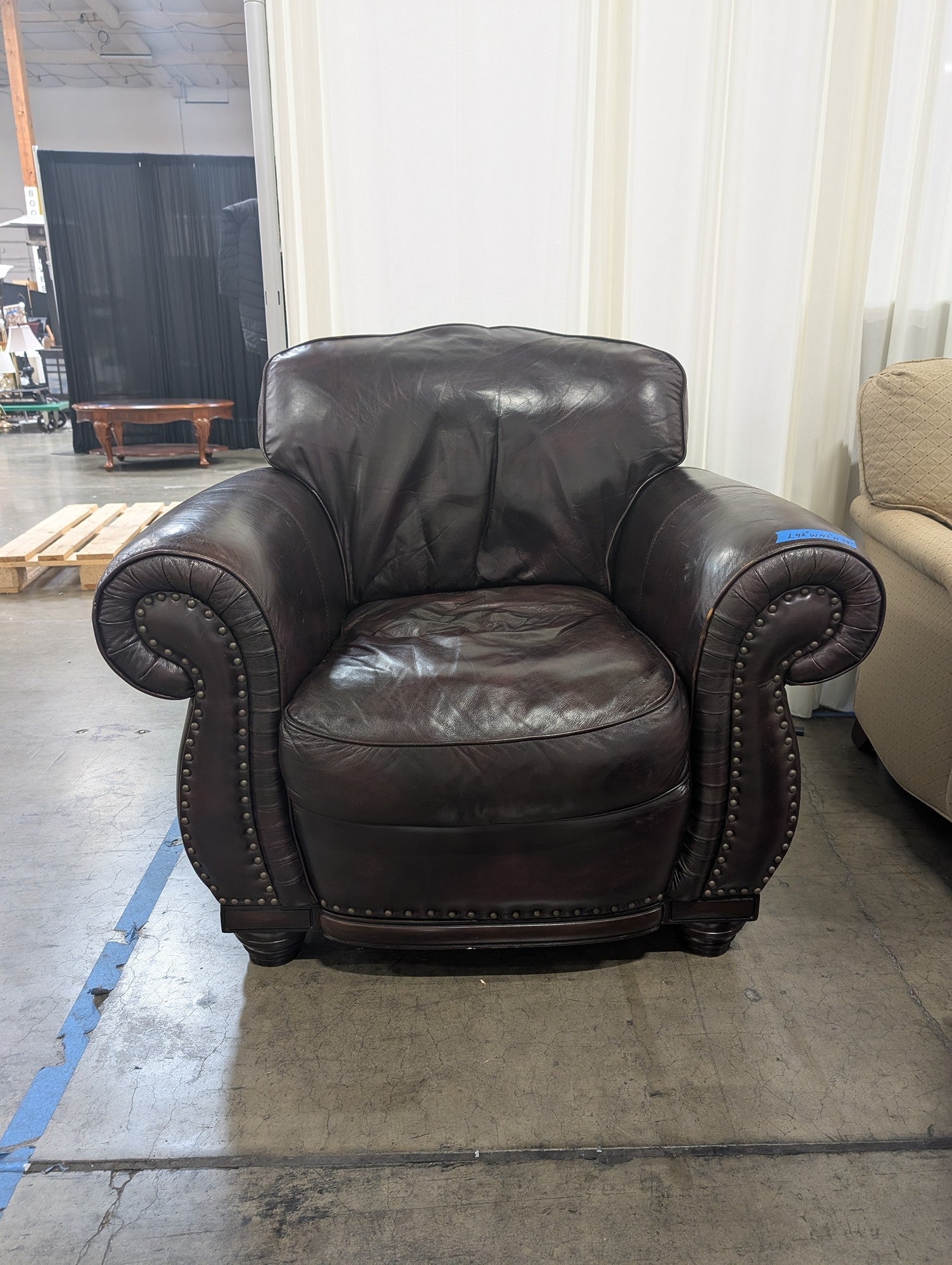 Dark Brown Leather Armchair and Ottoman with Nailhead Trim