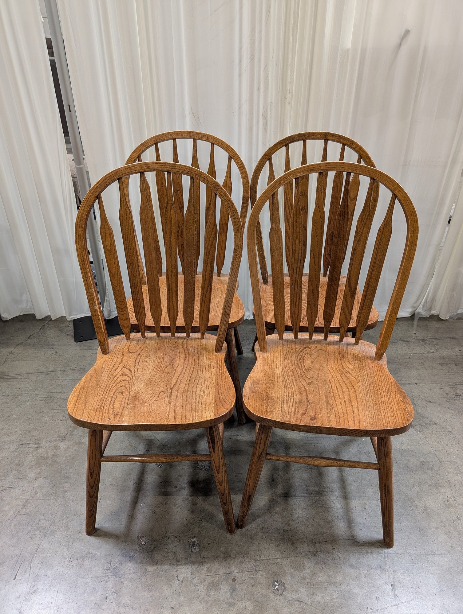 Four Arrowback Windsor Dining Chairs in Wood
