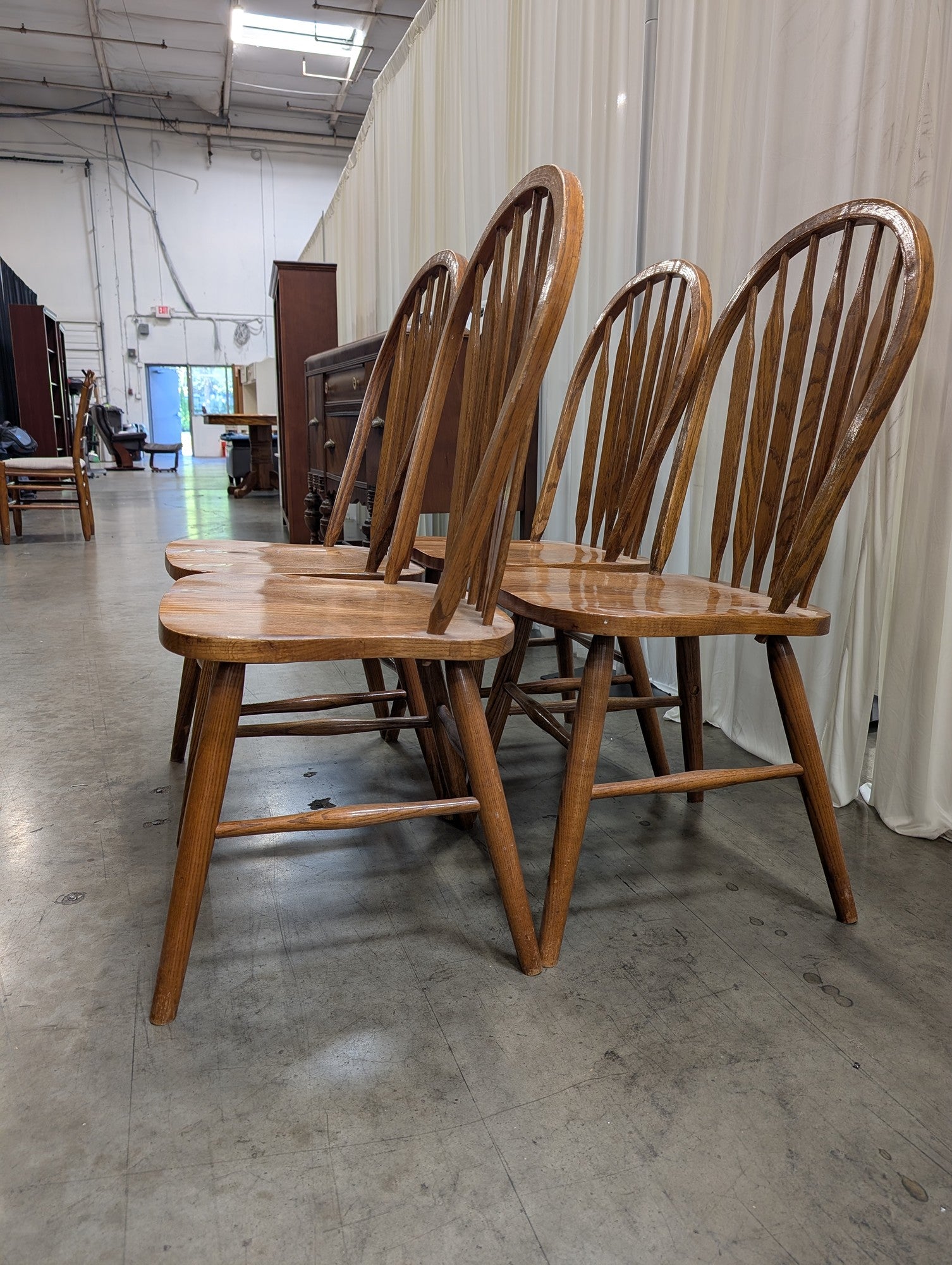 Four Arrowback Windsor Dining Chairs in Wood