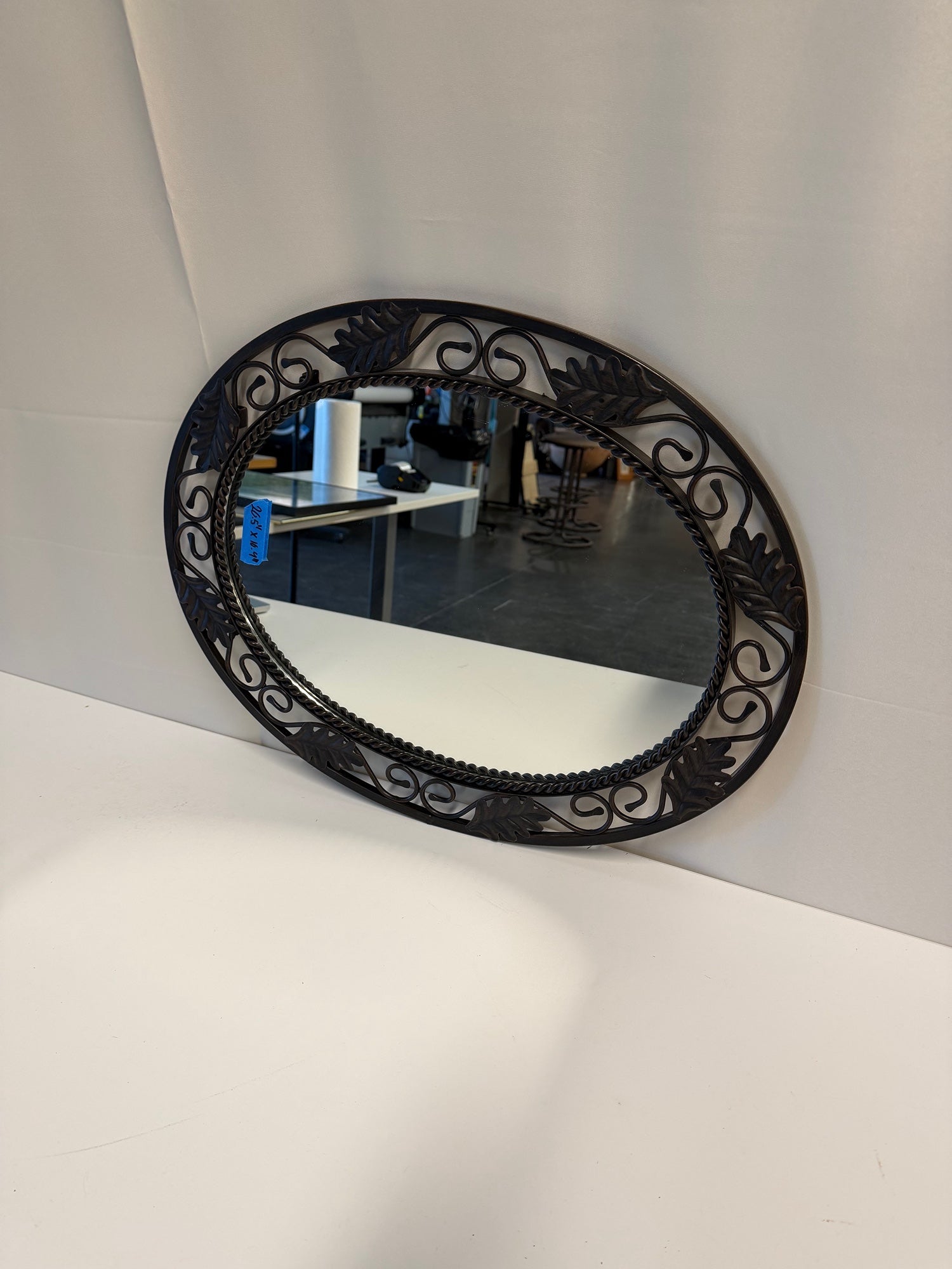 Ornate Oval Wall Mirror with Leaf and Scrollwork Frame