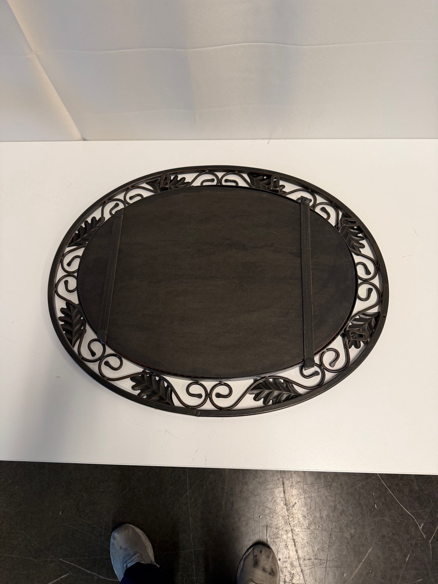 Ornate Oval Wall Mirror with Leaf and Scrollwork Frame
