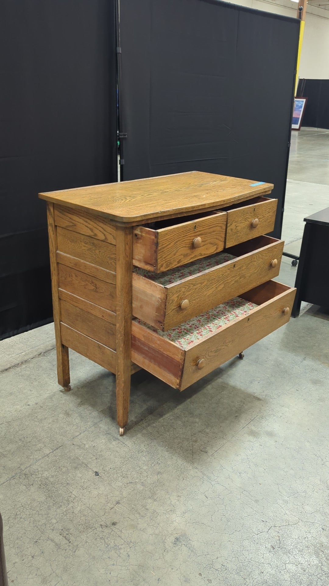 Light Oak Four-Drawer Dresser with Casters