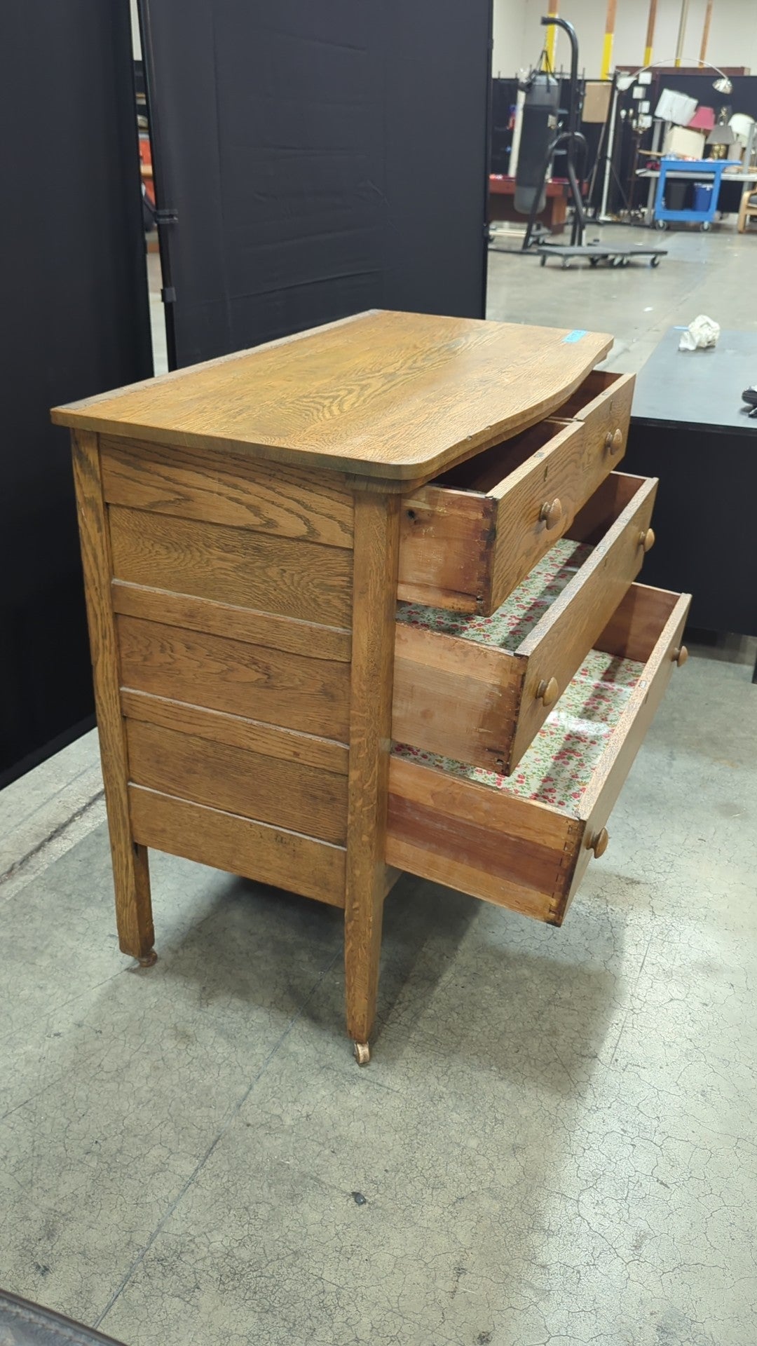 Light Oak Four-Drawer Dresser with Casters