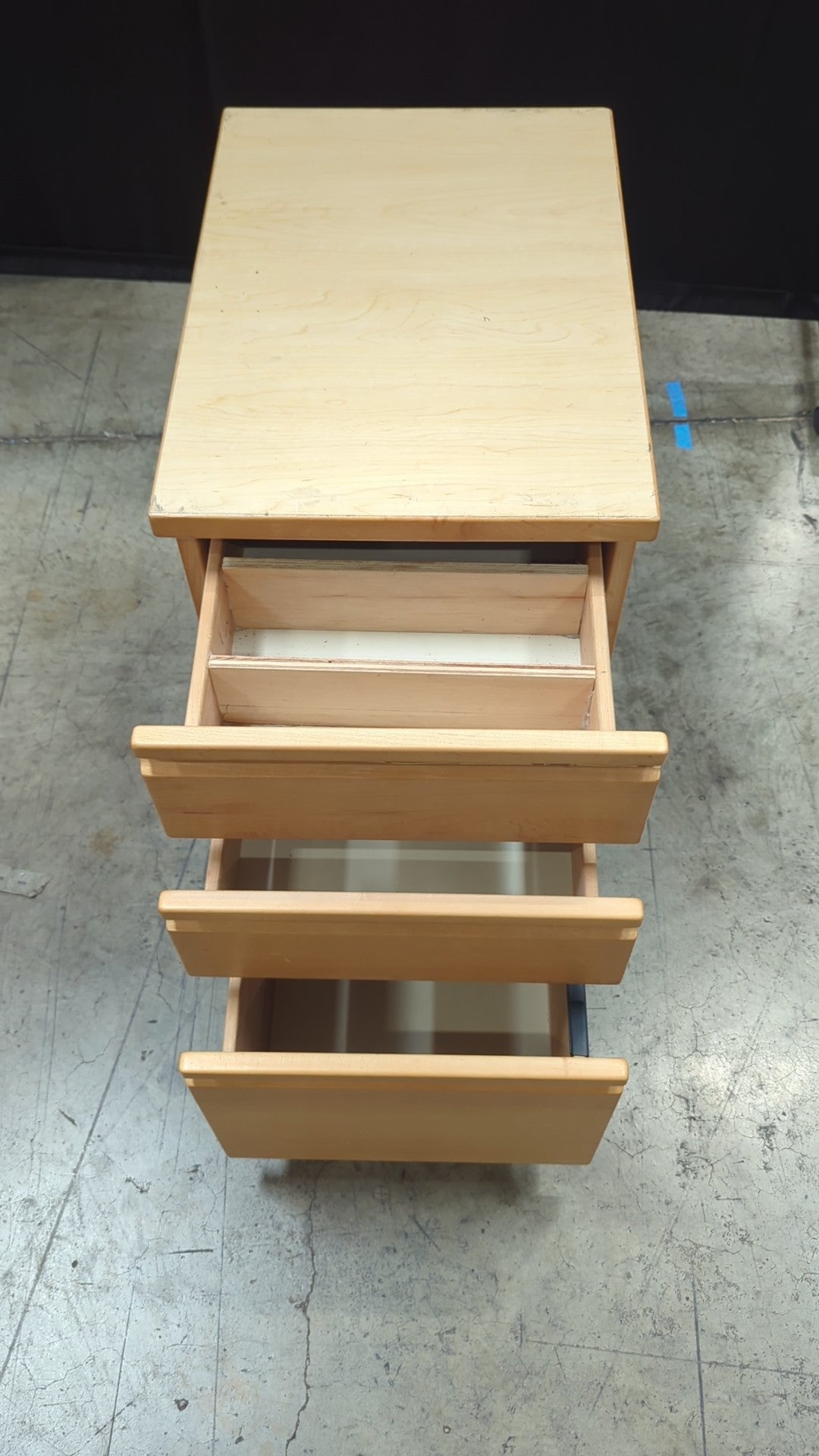 Light Wood Three-Drawer Cabinet with Casters