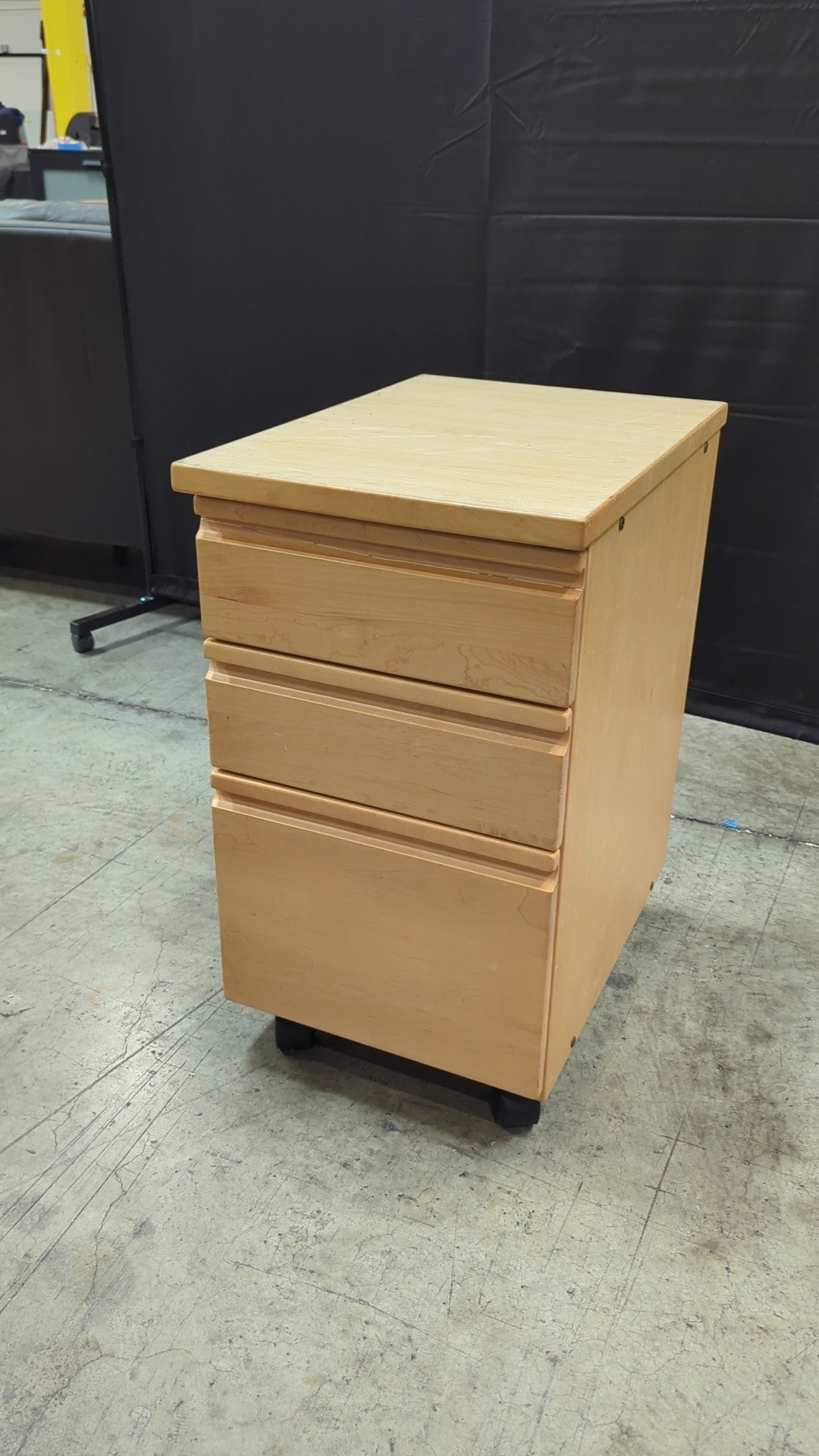 Light Wood Three-Drawer Cabinet with Casters