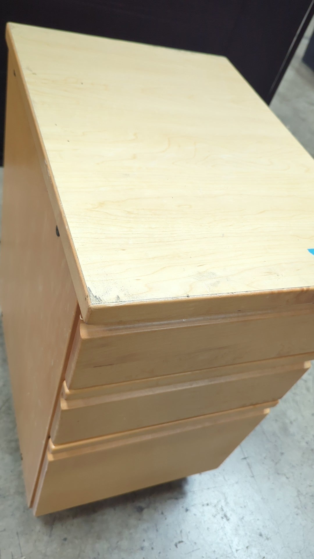 Light Wood Three-Drawer Cabinet with Casters