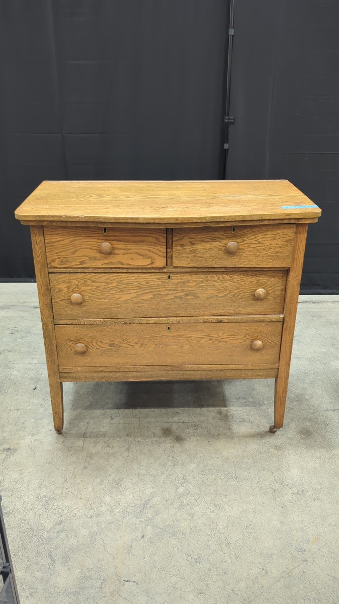 Light Oak Four-Drawer Dresser with Casters