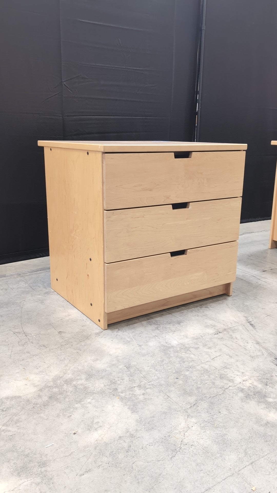 Light Wood Three-Drawer Dresser with Integrated Pulls