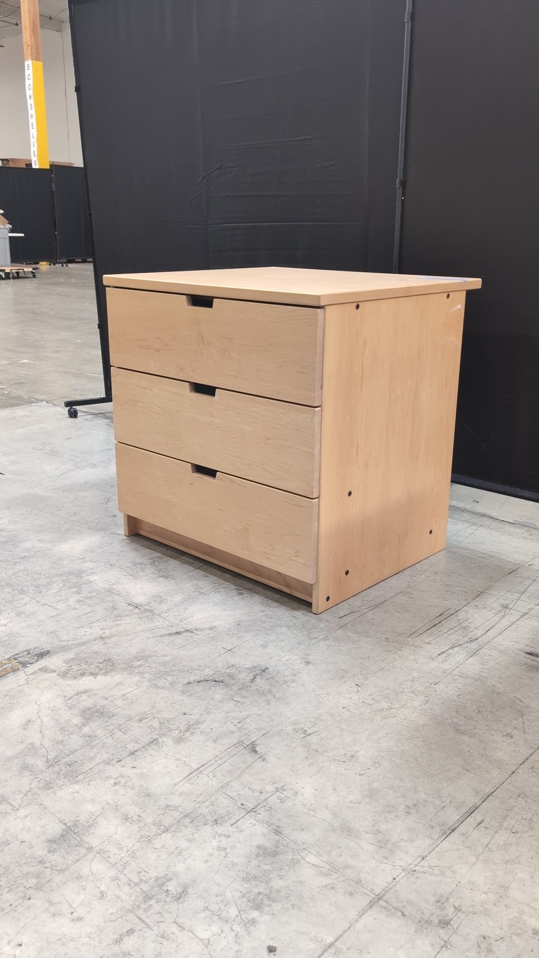 Light Wood Three-Drawer Dresser with Integrated Pulls