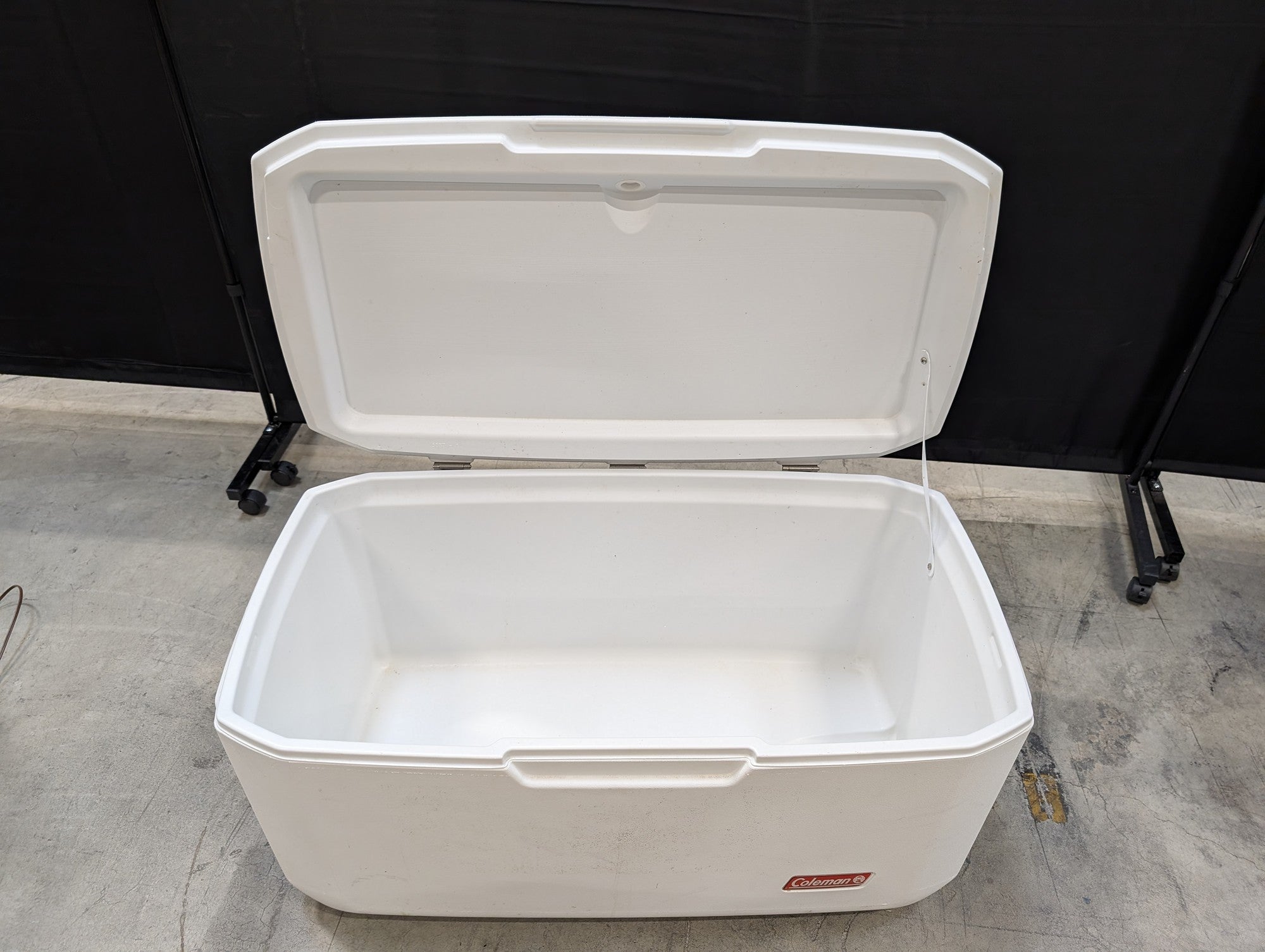 White Coleman Plastic Cooler with Cup Holders