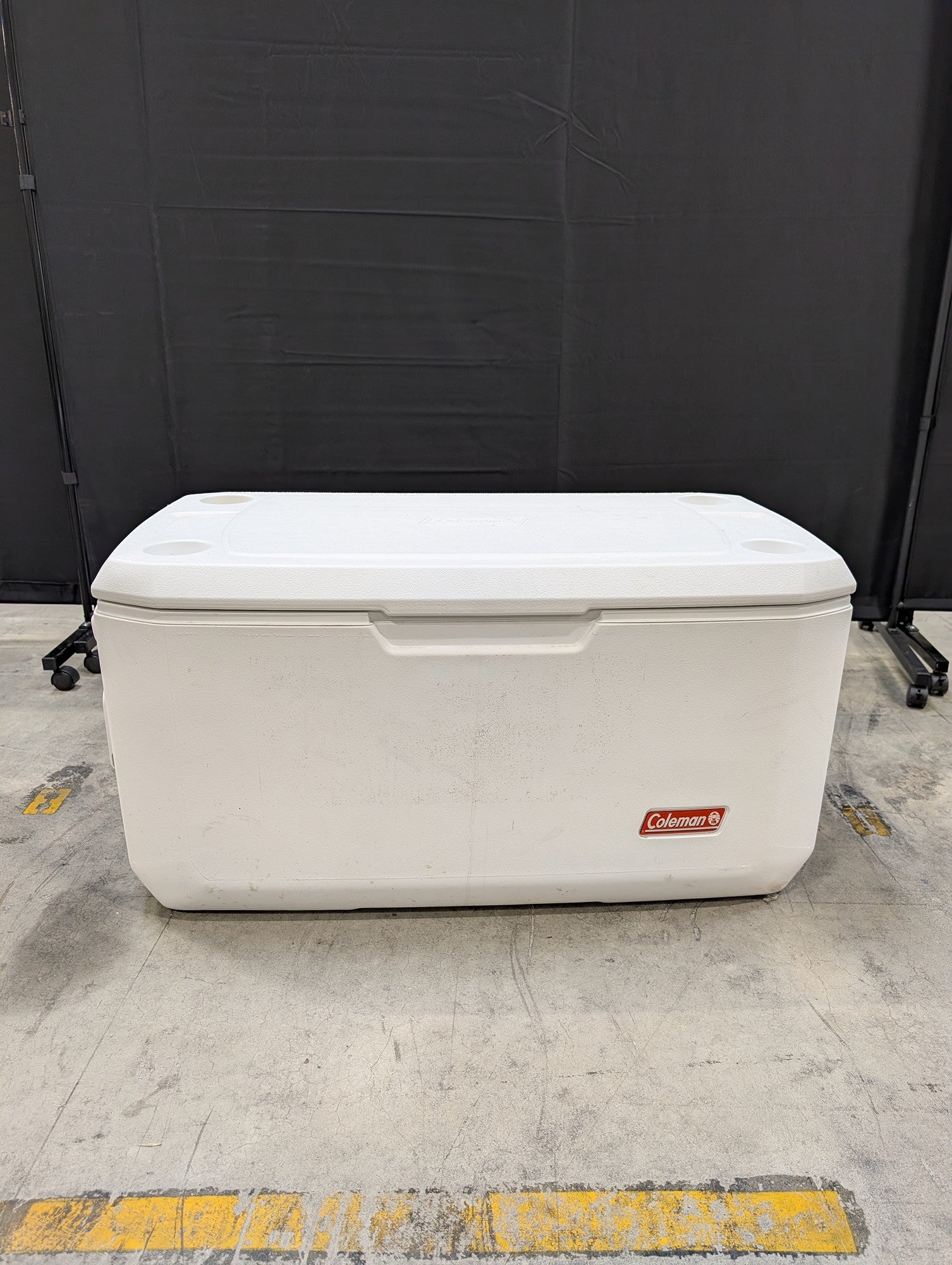 White Coleman Plastic Cooler with Cup Holders