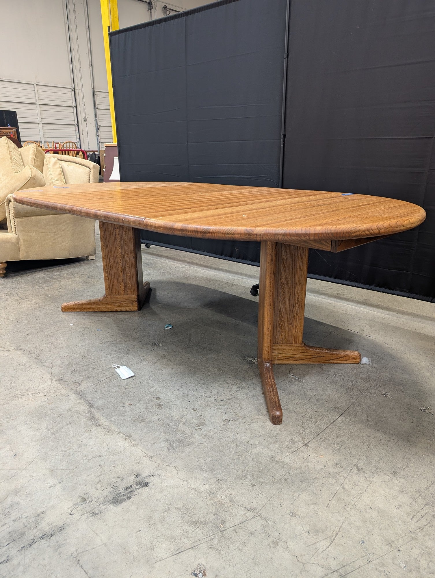 Oval Hardwood Pedestal Dining Table with Extension Leaf