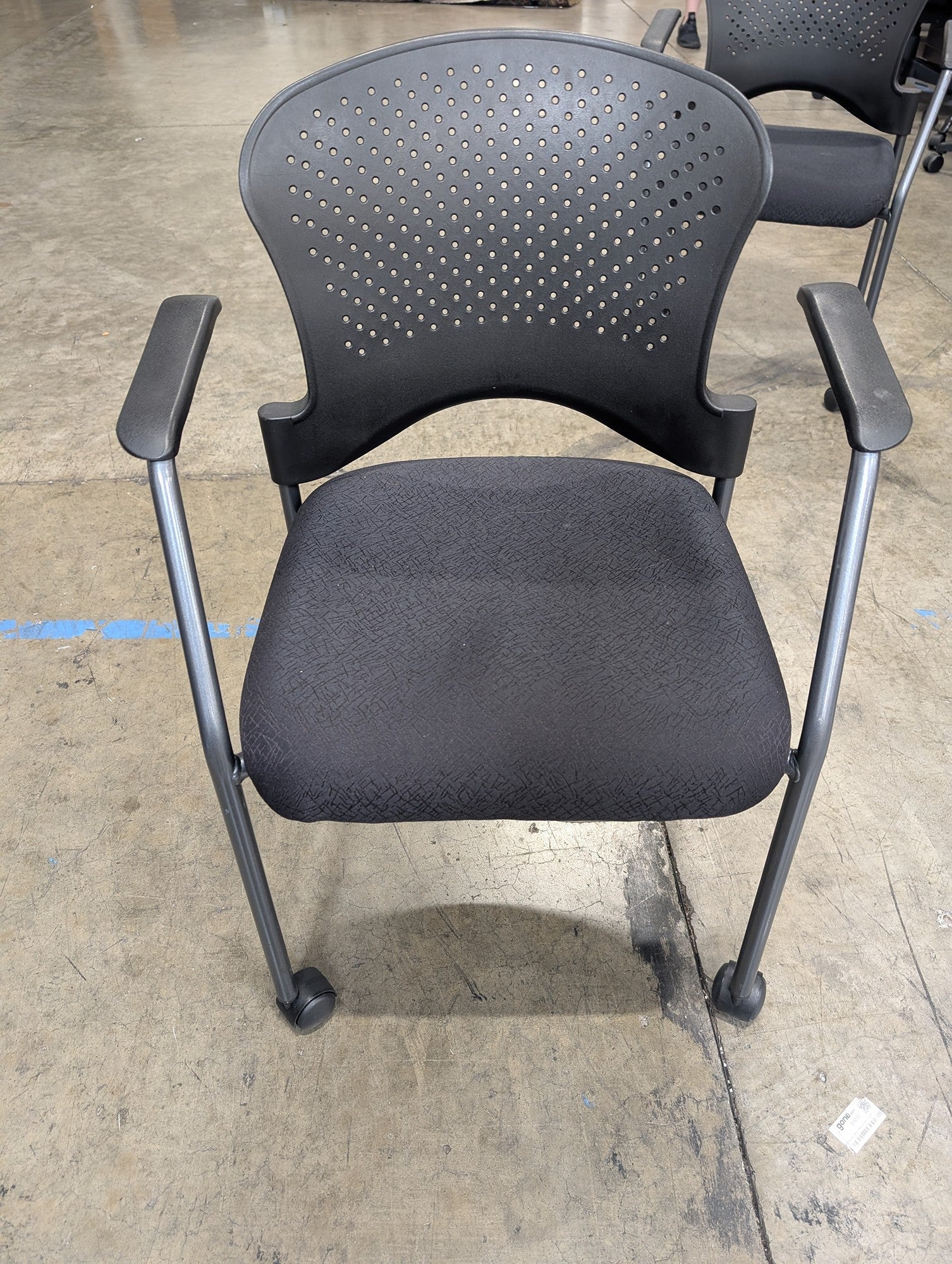 Black Rolling Office Chair with Perforated Back