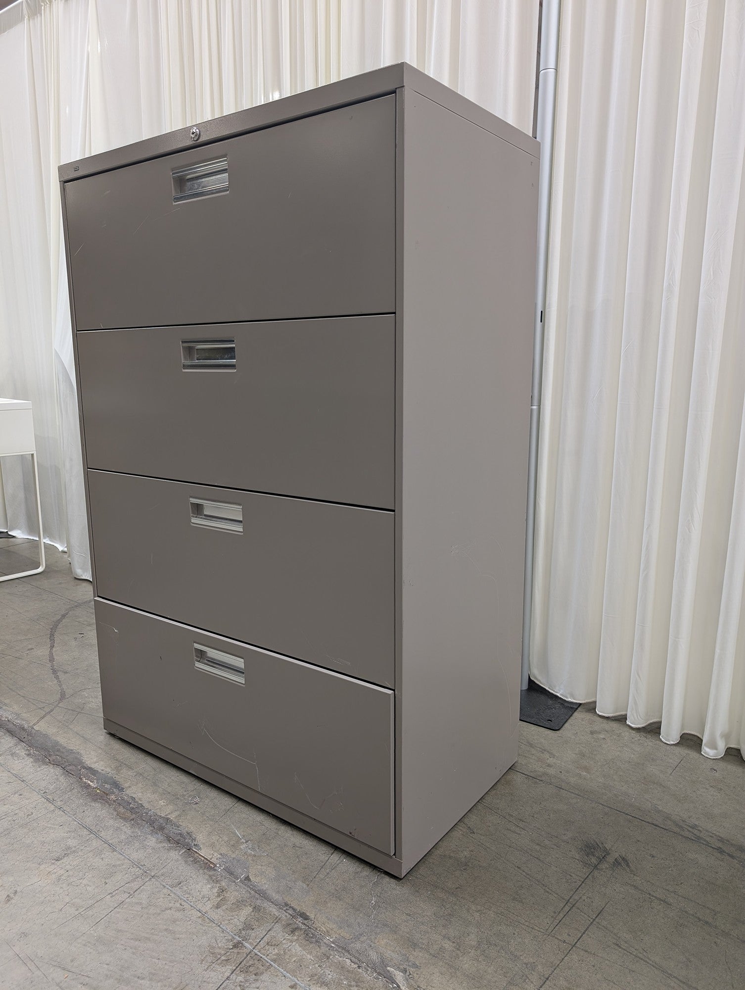 HON Grey Four-Drawer Filing Cabinet in Metal
