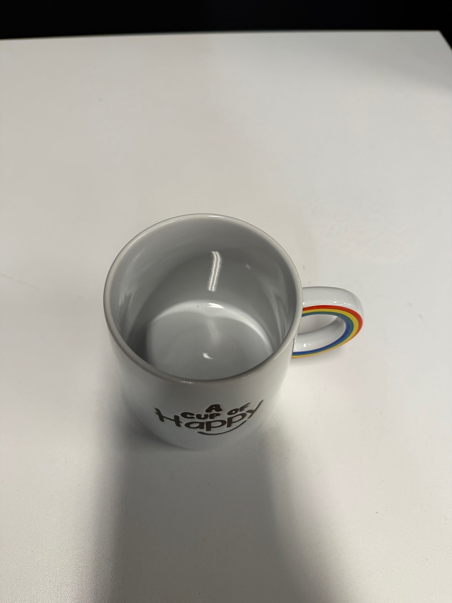 World Market White Ceramic Mug with Rainbow Handle