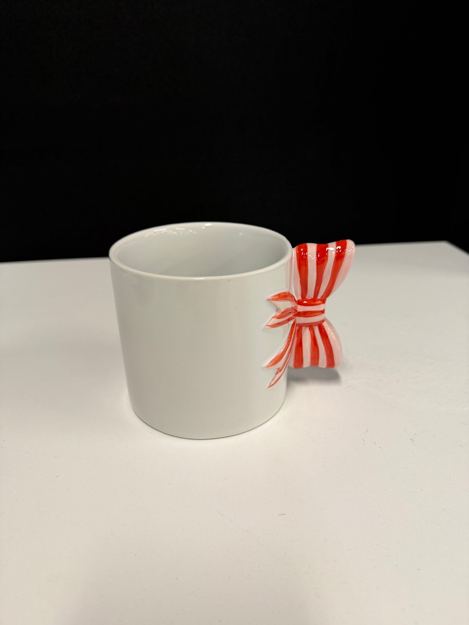 SPR!TZ White Stoneware Mug with Red Bow Handle