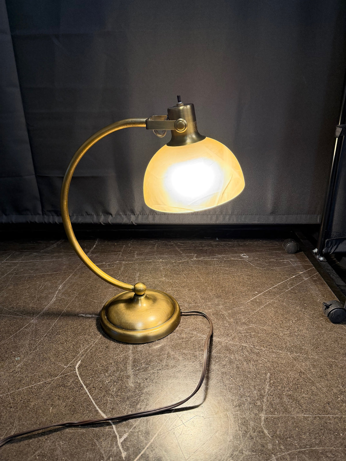 Brass-Toned Curved Arm Desk Lamp with Frosted Glass Shade