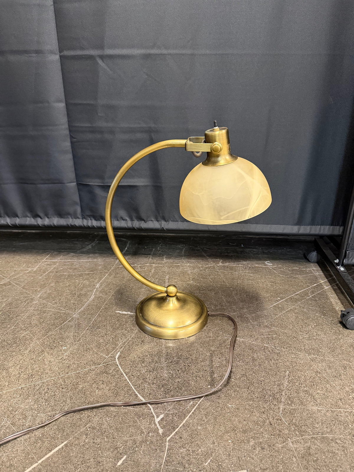 Brass-Toned Curved Arm Desk Lamp with Frosted Glass Shade