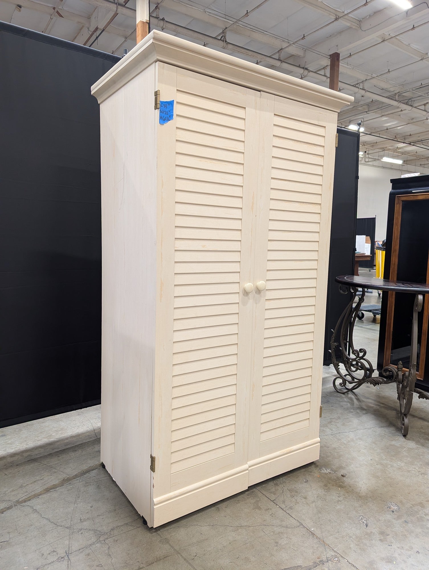 Cream Louvered Door Armoire with Integrated Pull-Out Desk