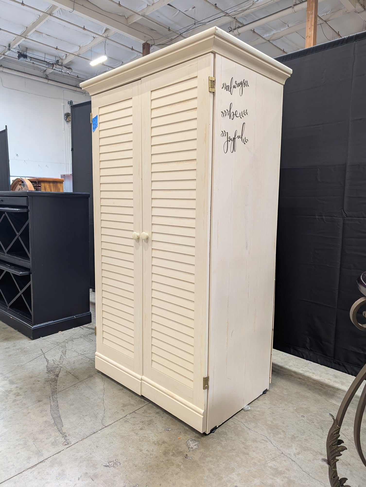 Cream Louvered Door Armoire with Integrated Pull-Out Desk