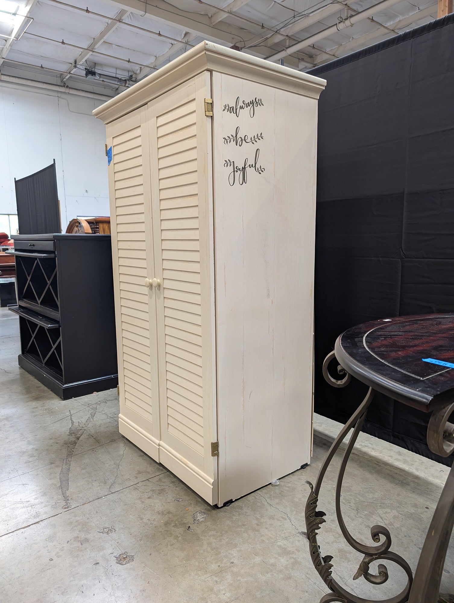 Cream Louvered Door Armoire with Integrated Pull-Out Desk