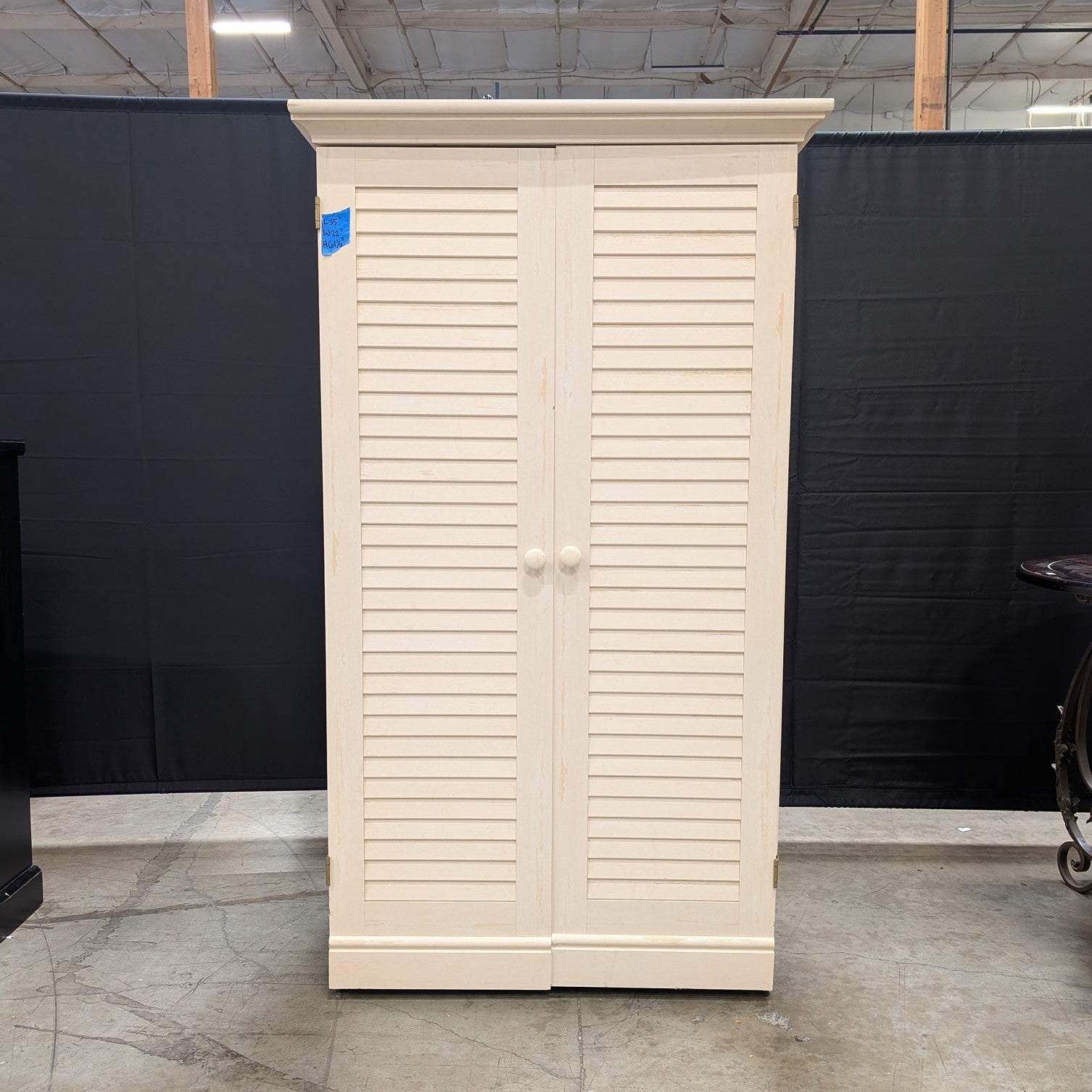 Cream Louvered Door Armoire with Integrated Pull-Out Desk