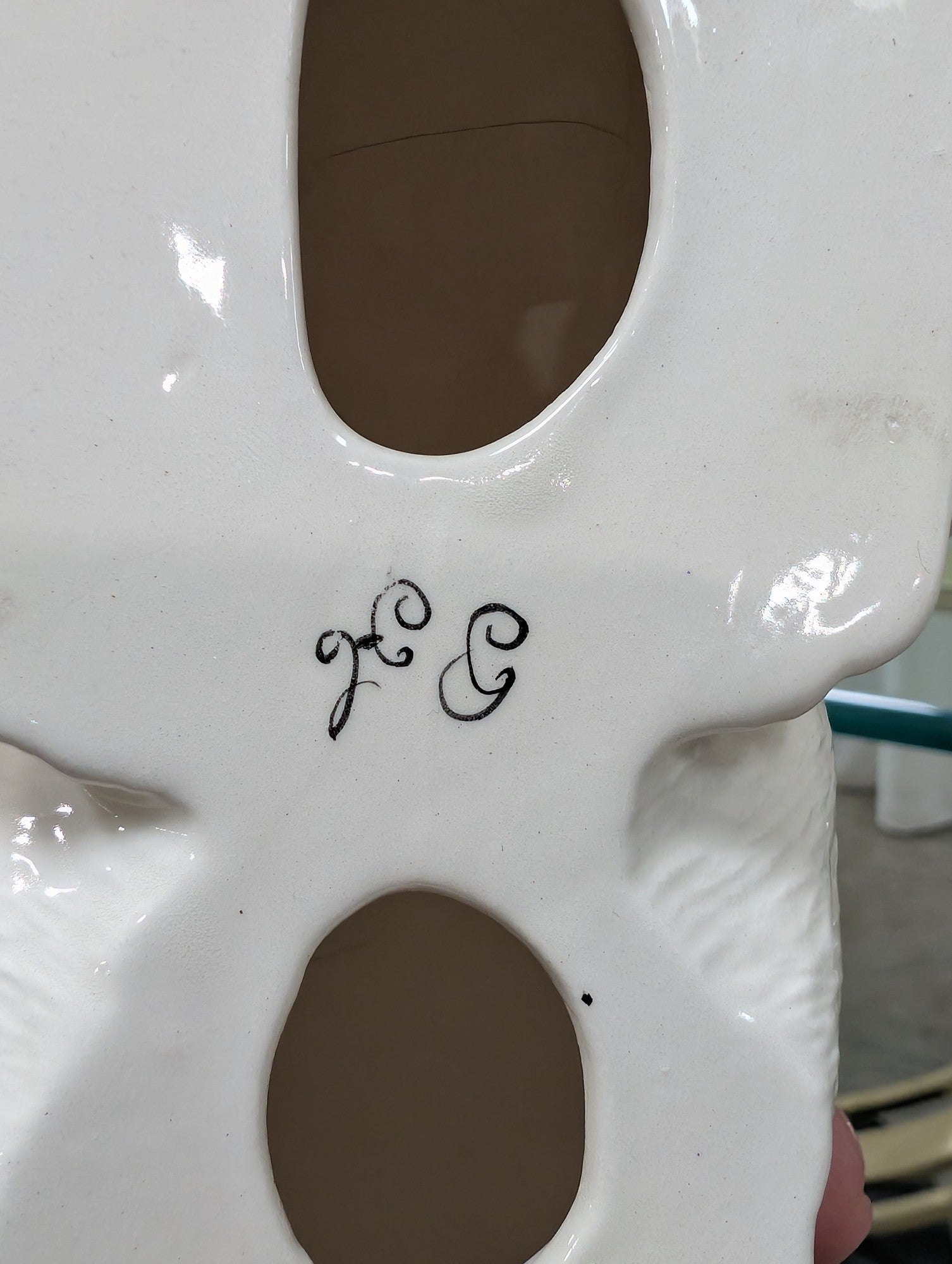 White Ceramic Cat Figurine with Pink Ribbon