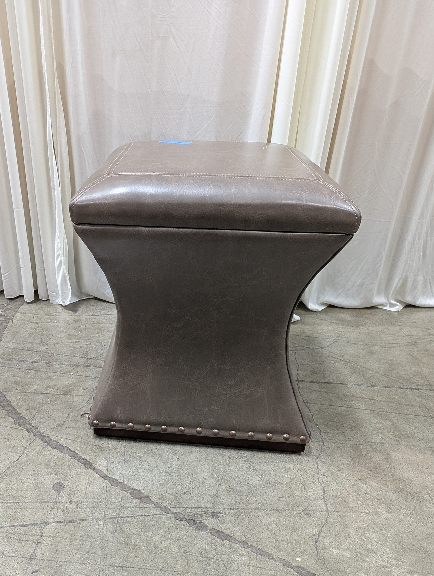 Taupe Faux Leather Ottoman with Nailhead Trim