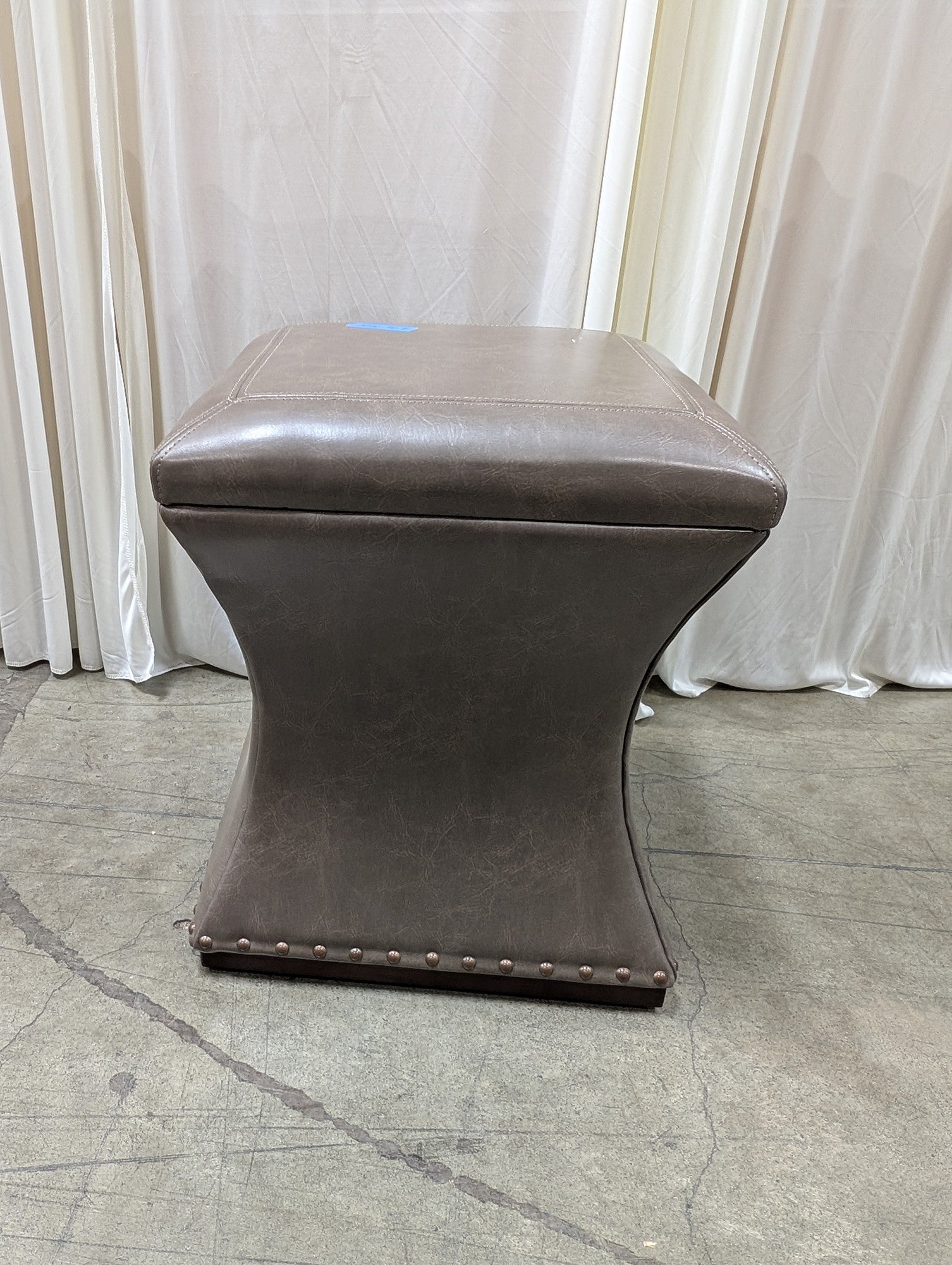 Taupe Faux Leather Ottoman with Nailhead Trim