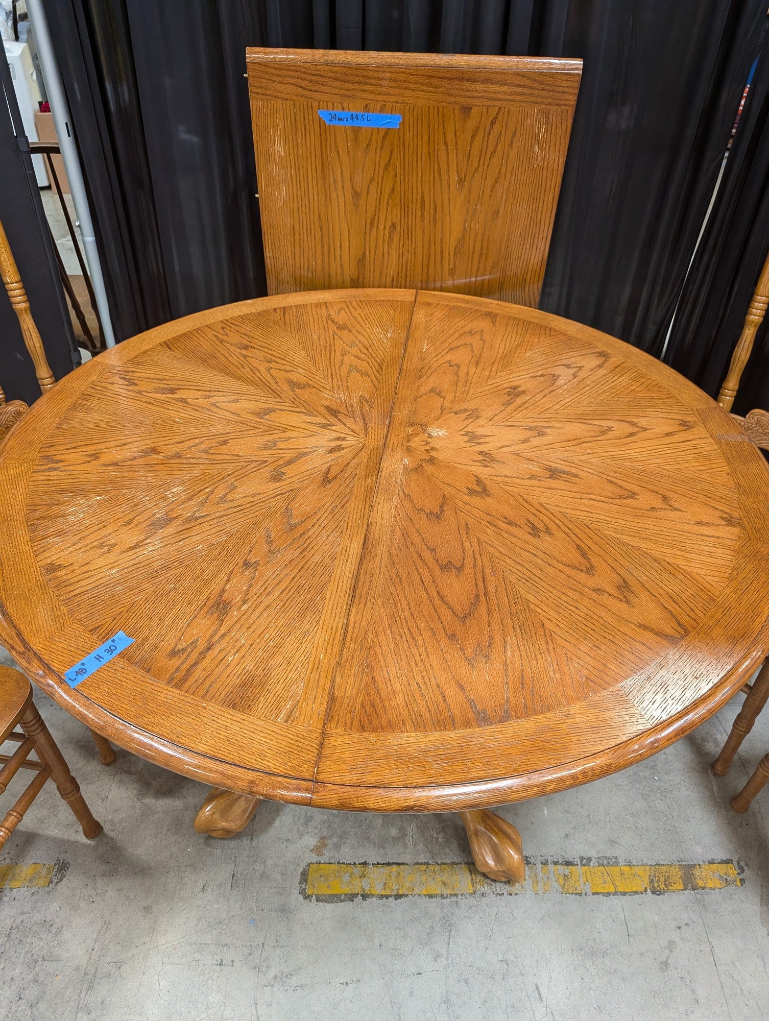 Oak-Tone Pedestal Wood Dining Table with Four Carved Chairs