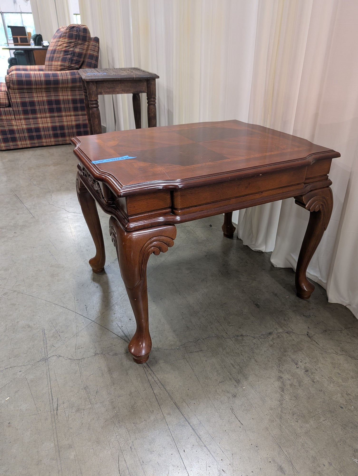 Traditional Dark Wood End Table with Carved Details