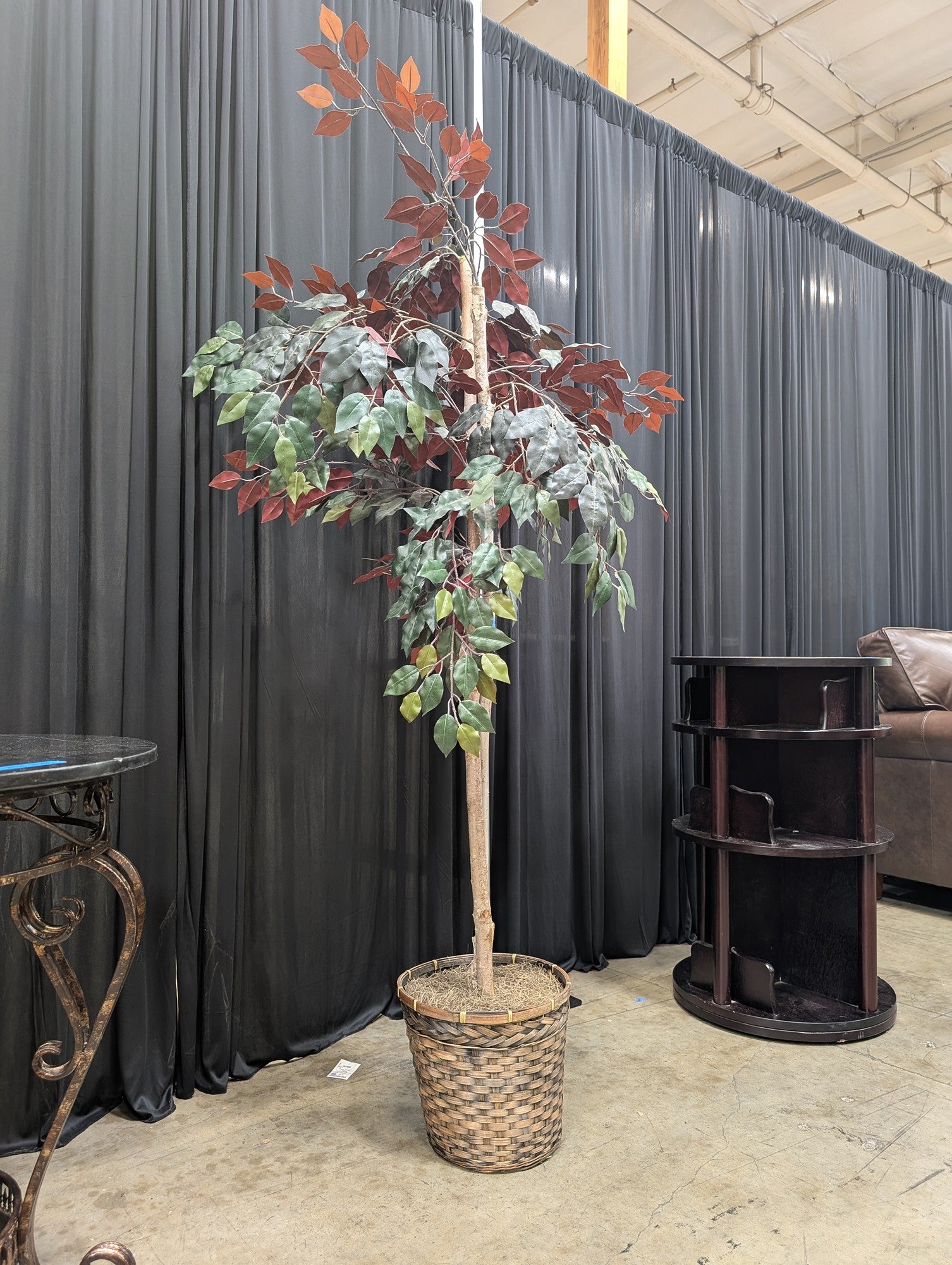 Green and Burgundy Artificial Tree in Woven Basket