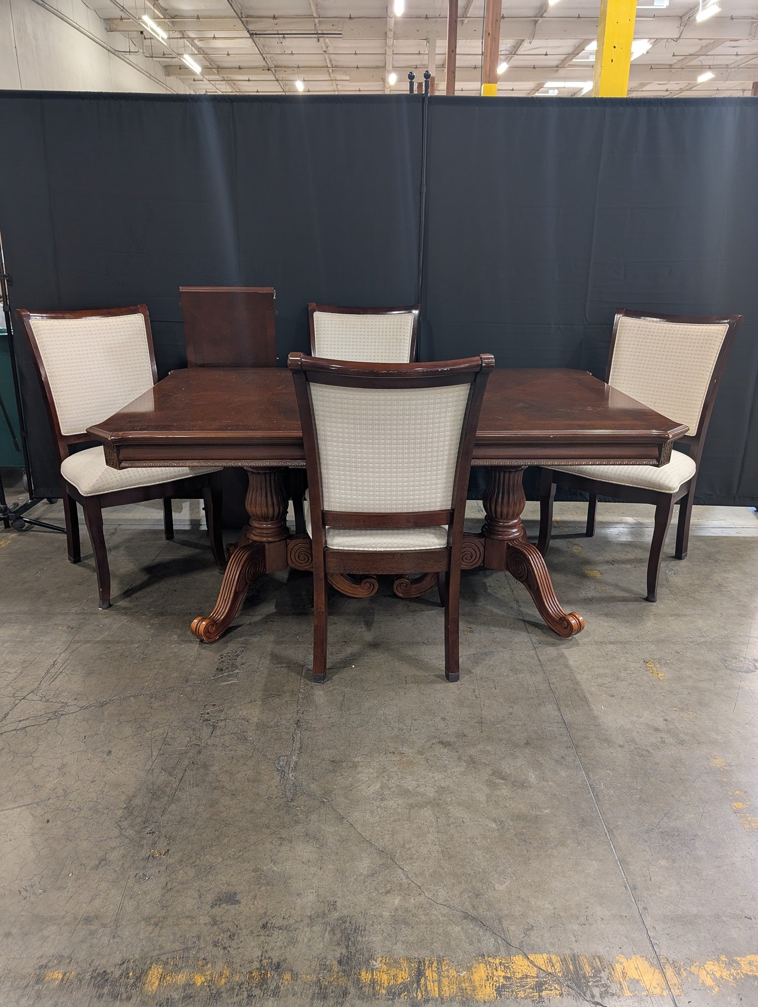 Ornate Dark Wood Pedestal Dining Table with Upholstered Chairs