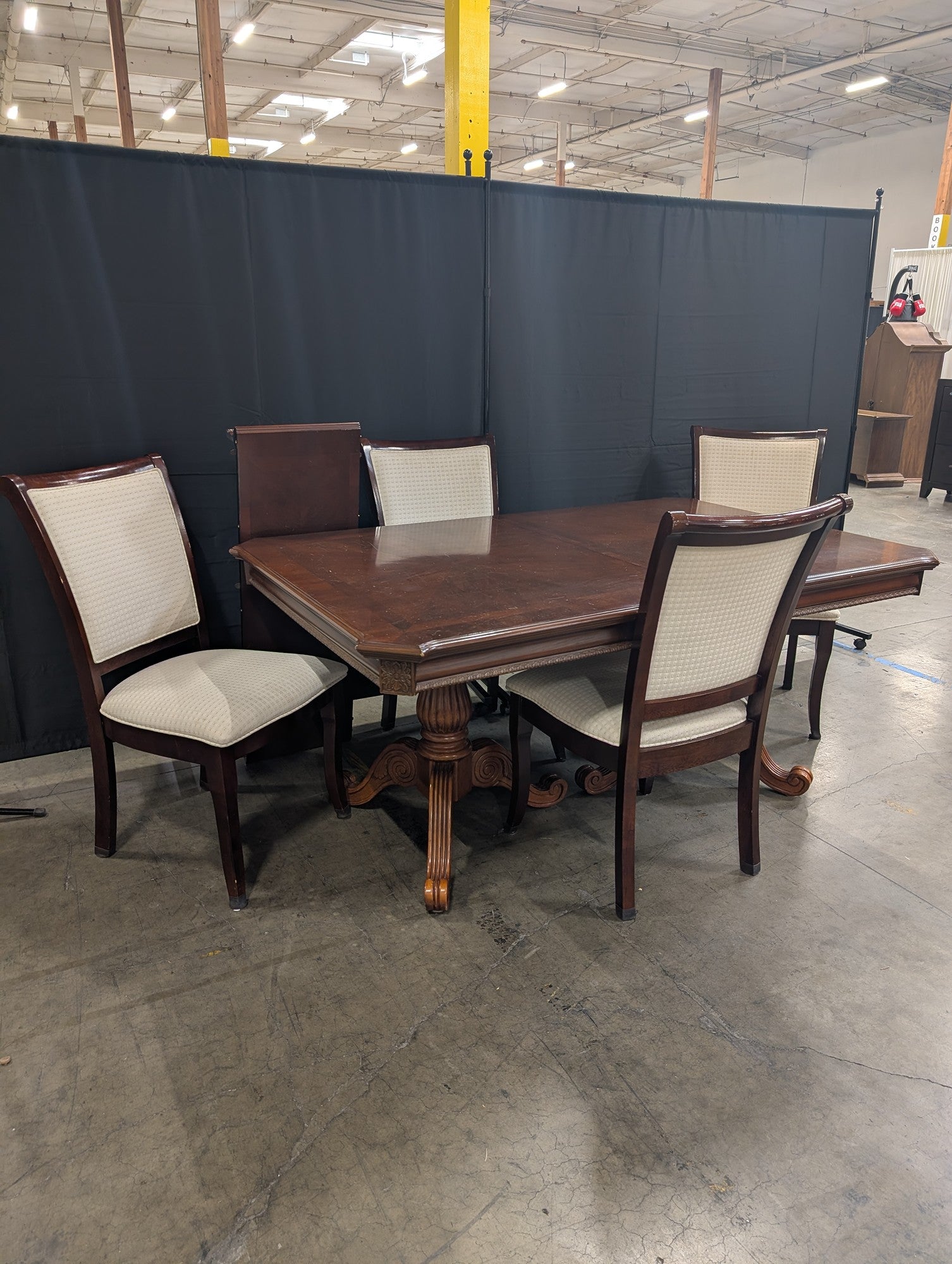 Ornate Dark Wood Pedestal Dining Table with Upholstered Chairs