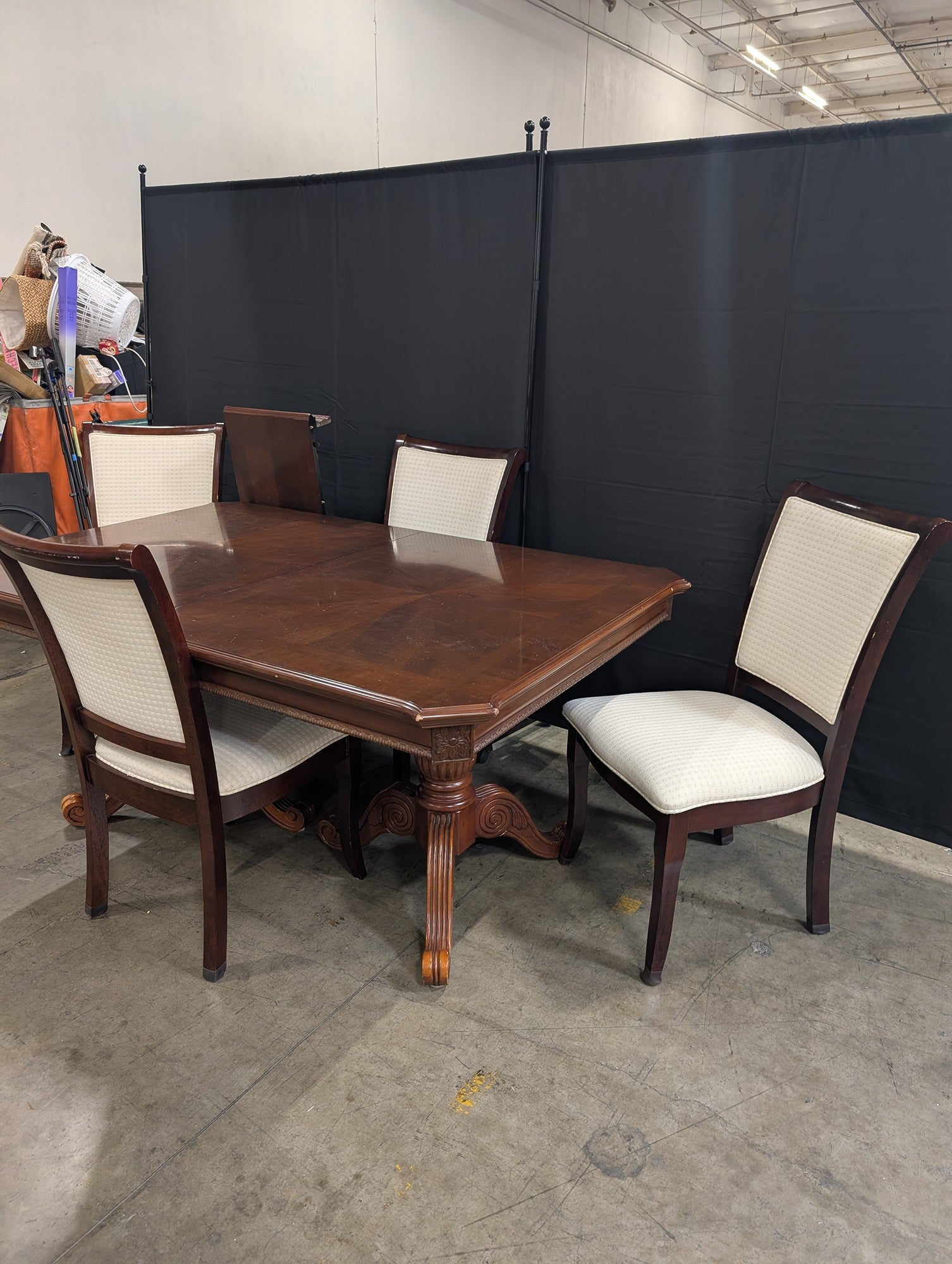 Ornate Dark Wood Pedestal Dining Table with Upholstered Chairs