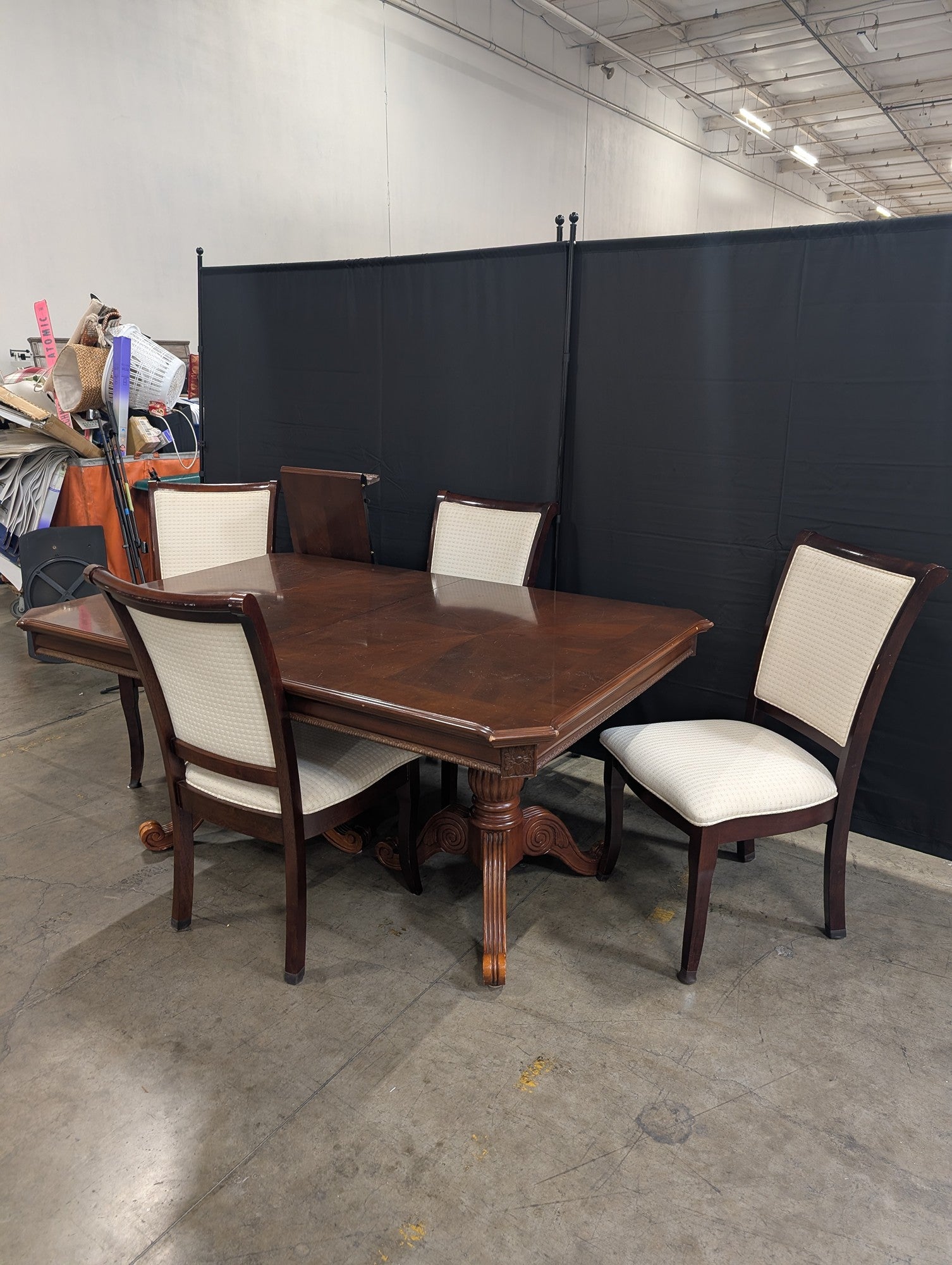 Ornate Dark Wood Pedestal Dining Table with Upholstered Chairs
