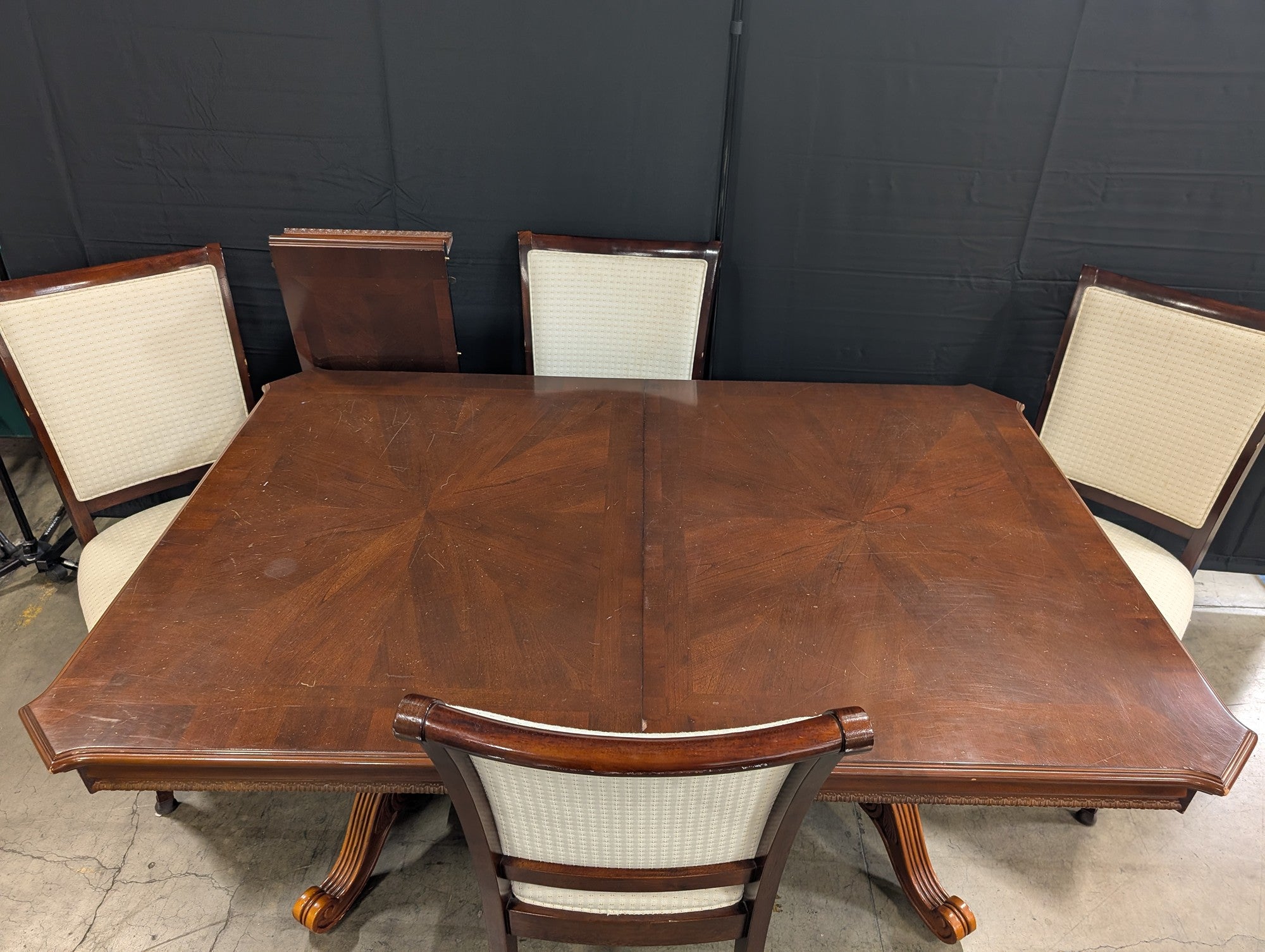 Ornate Dark Wood Pedestal Dining Table with Upholstered Chairs