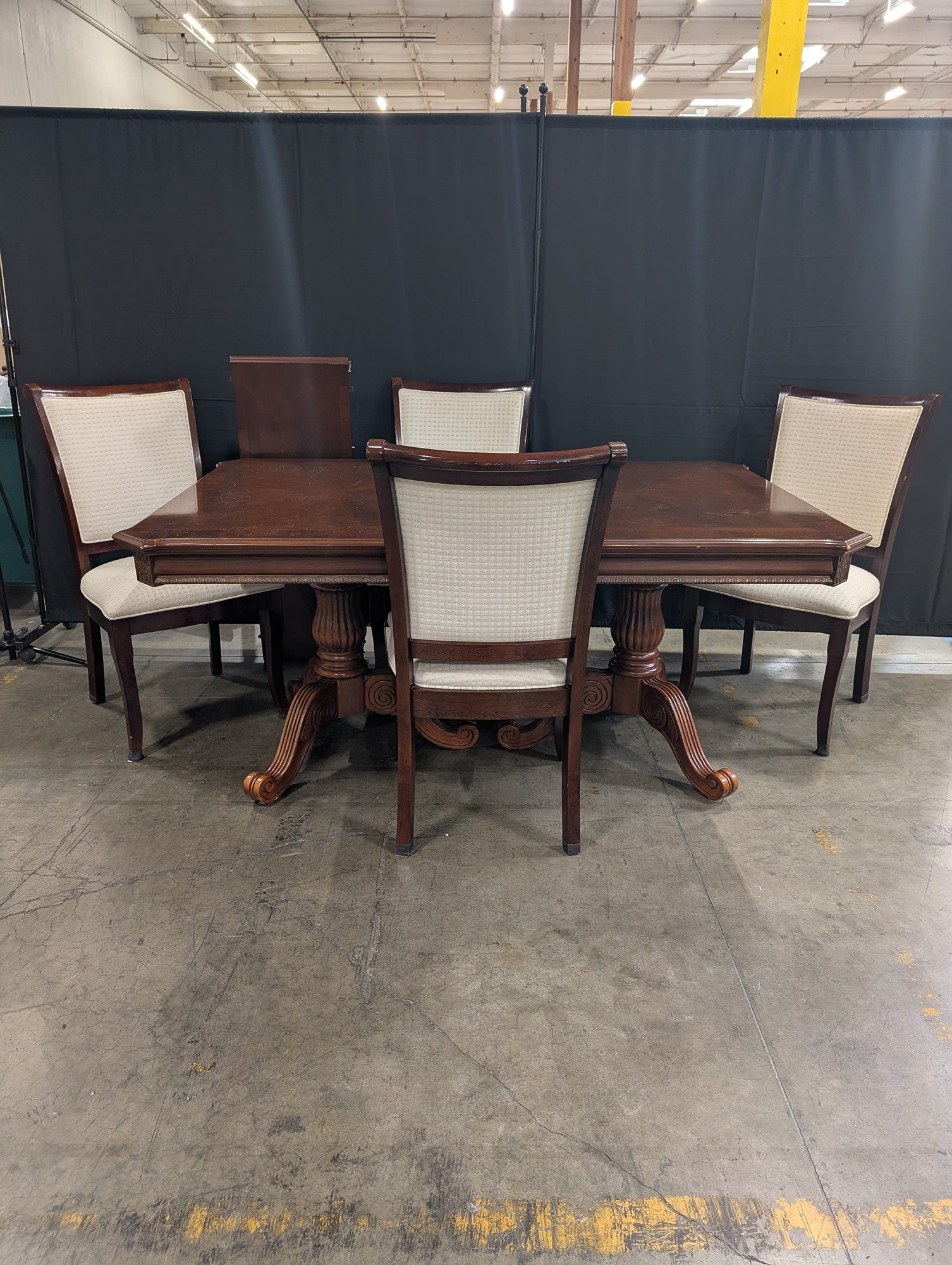 Ornate Dark Wood Pedestal Dining Table with Upholstered Chairs