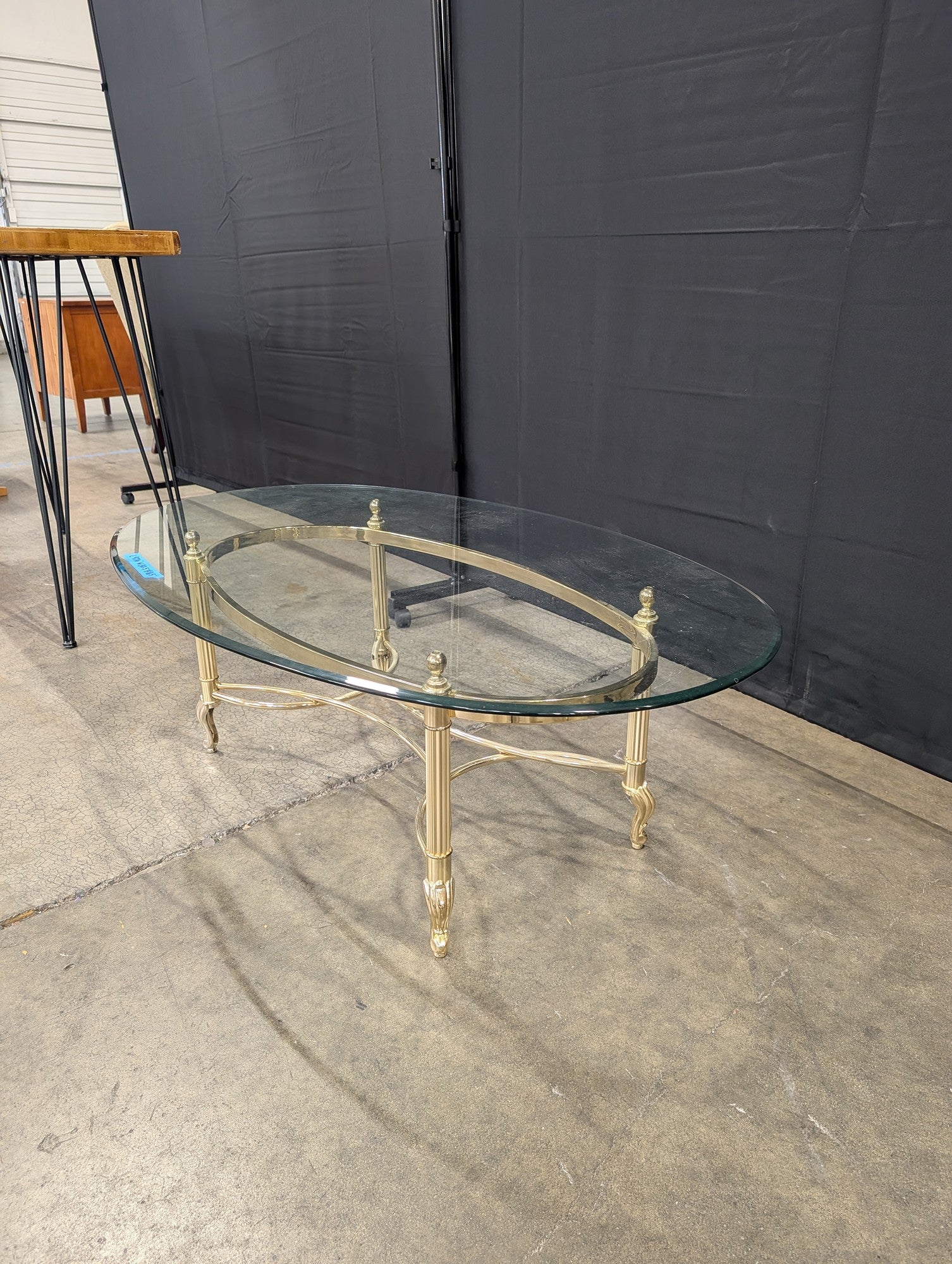 Oval Glass Coffee Table with Brass Legs