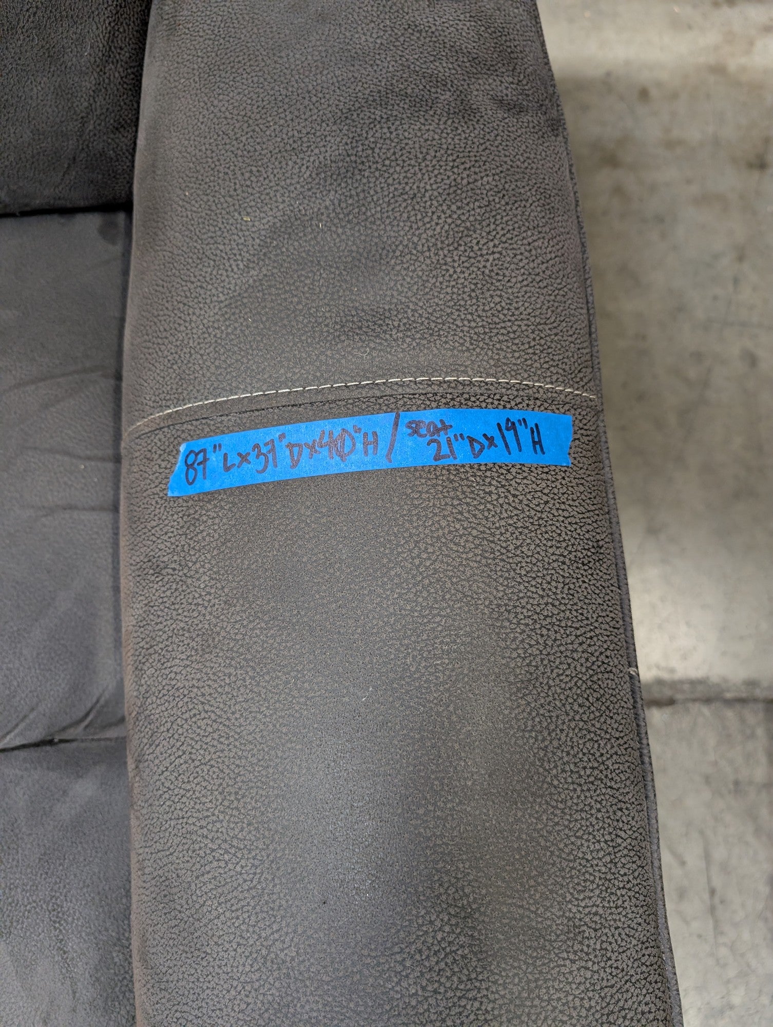 Textured Grey Reclining Three-Seat Couch