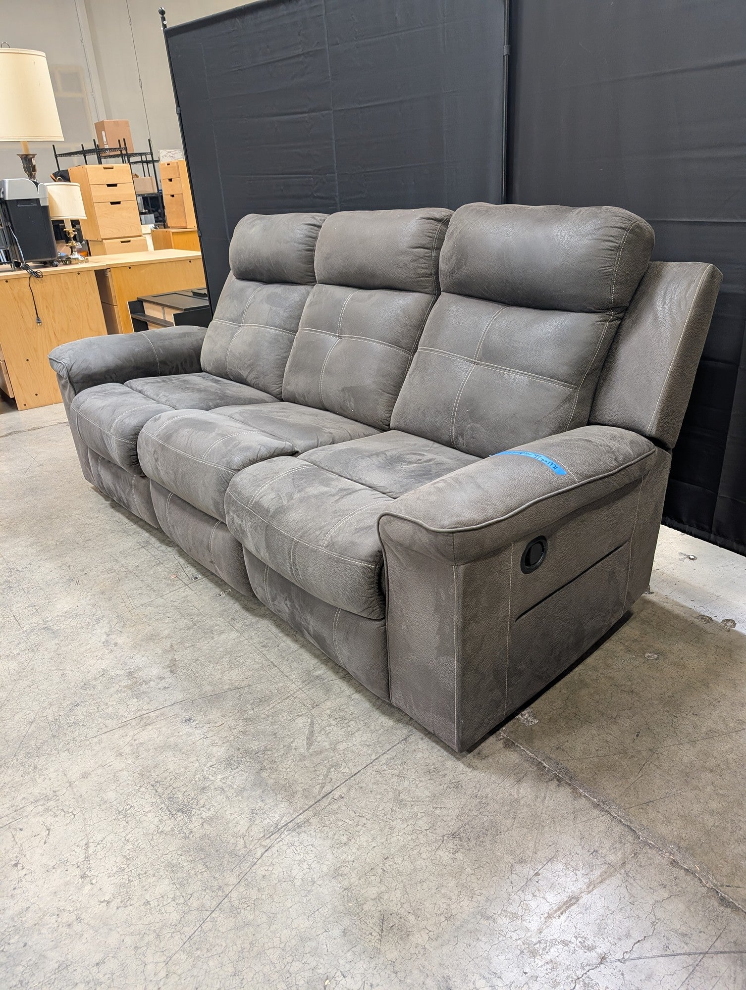 Textured Grey Reclining Three-Seat Couch