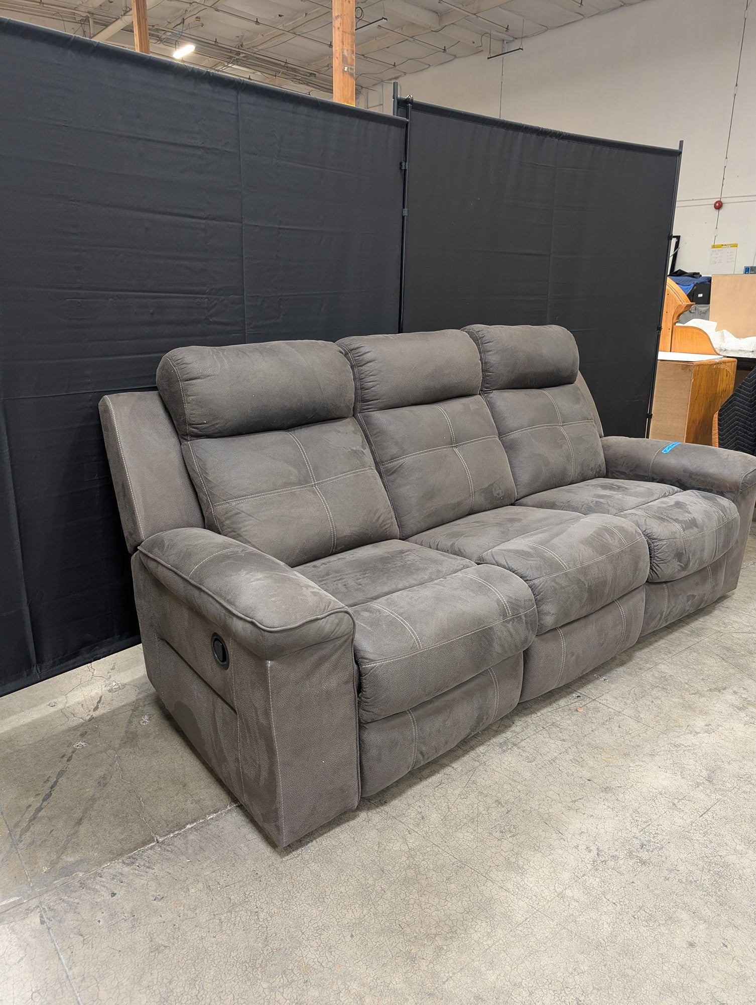 Textured Grey Reclining Three-Seat Couch
