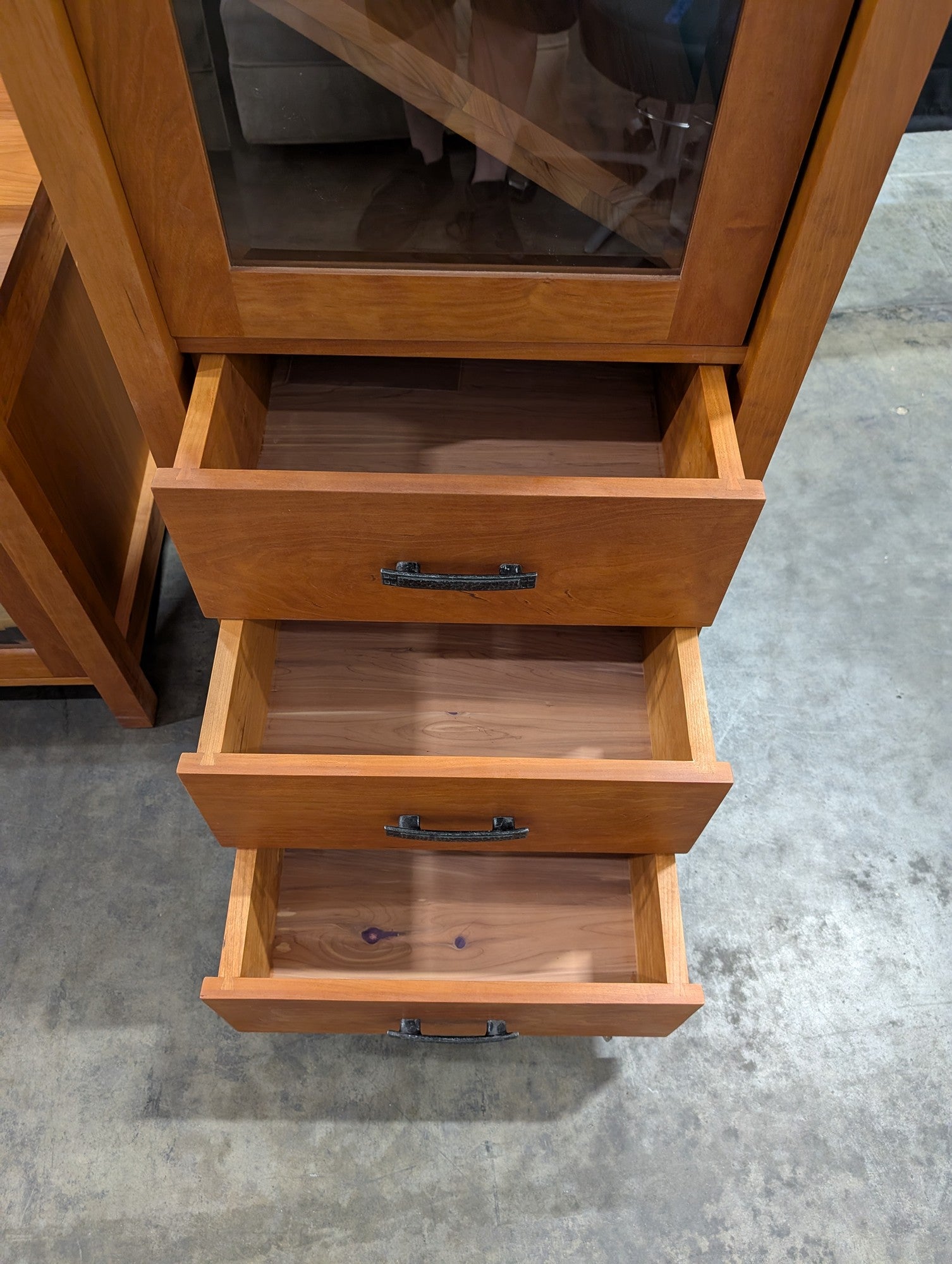 Cherry Toned Wood Entertainment Center with Glass Doors