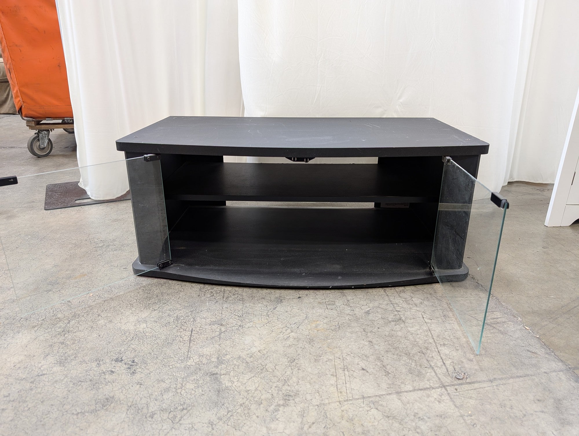 Black Wood Composite Curved Front TV Stand with Glass Doors