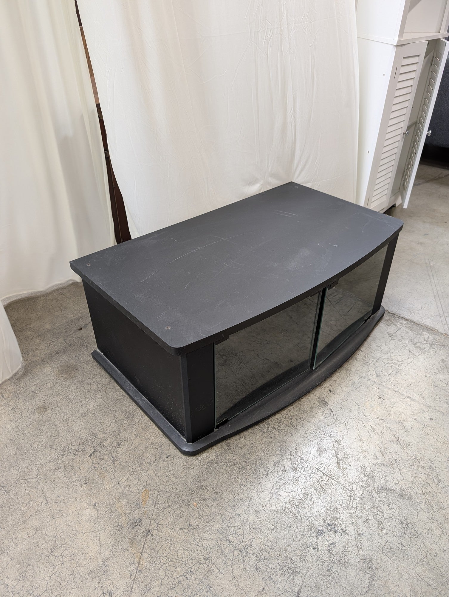 Black Wood Composite Curved Front TV Stand with Glass Doors
