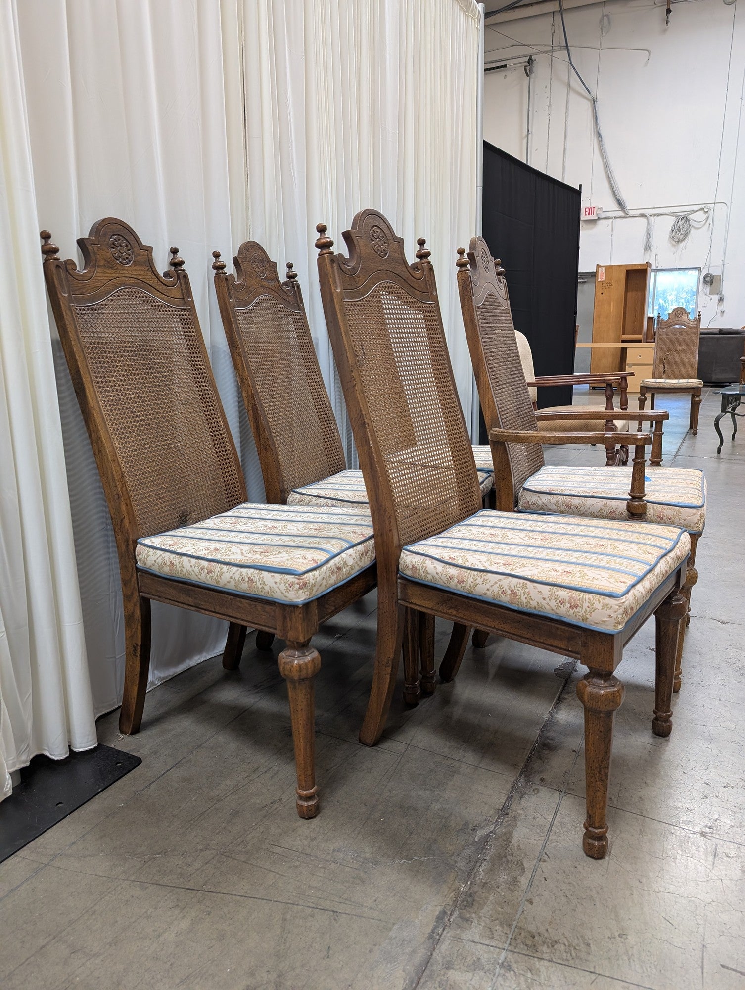 Set of Five American Street Furniture Carved Wood Dining Chairs with Cane Backs
