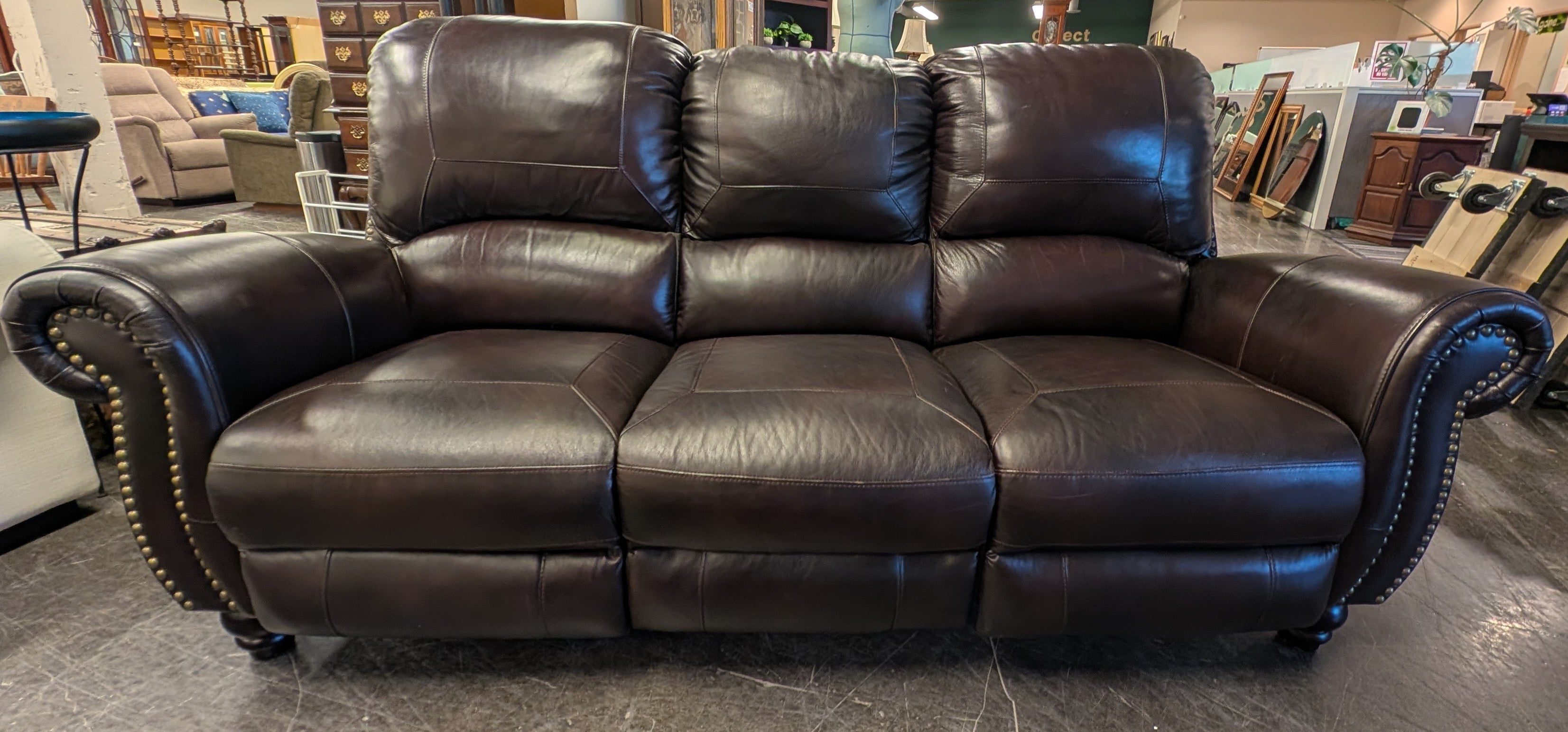 Dark Brown Three-Seat Reclining Sofa with Nailhead Trim