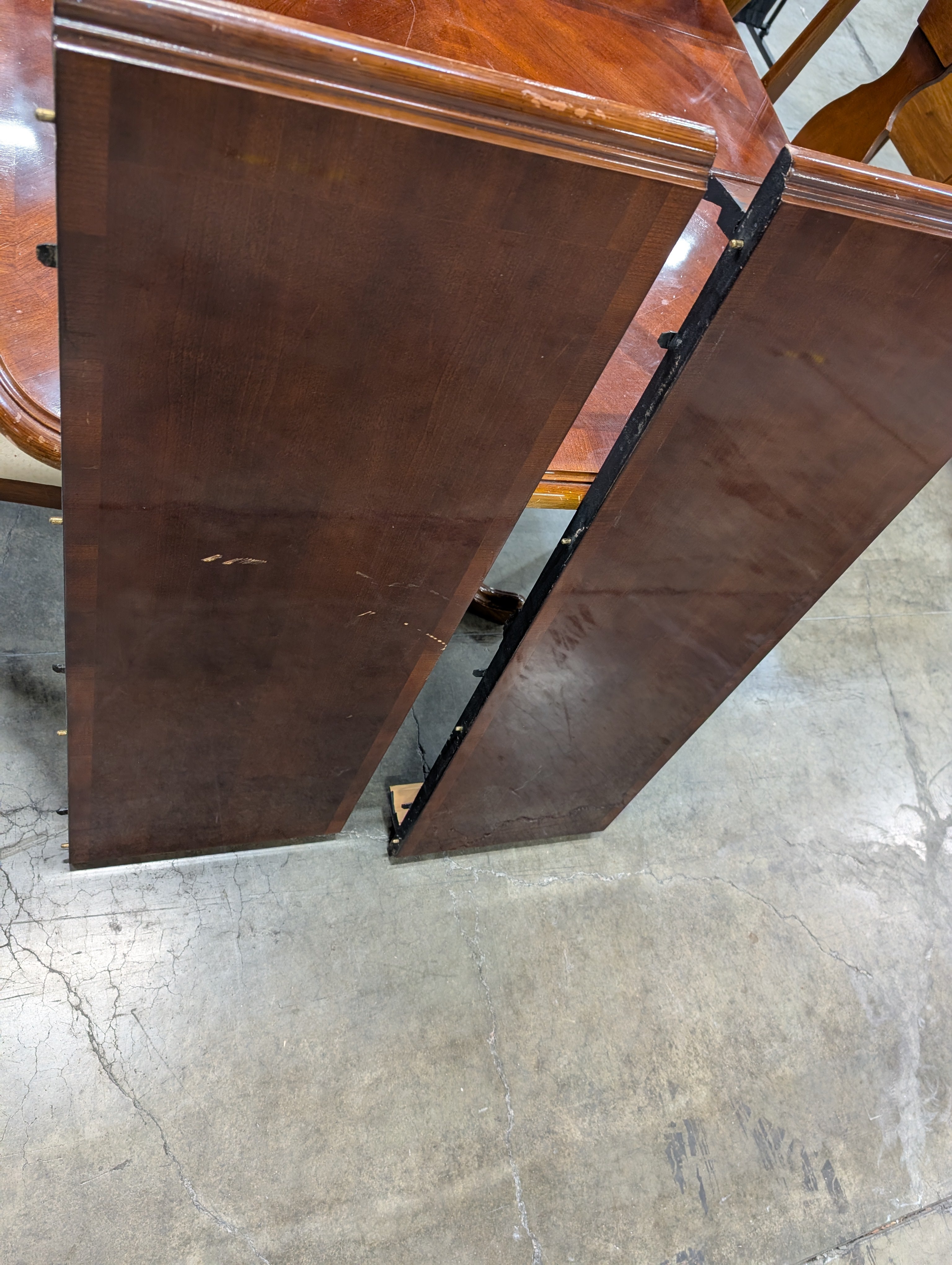 Traditional Dark Wood Dining Table with Six Shaped-Back Chairs