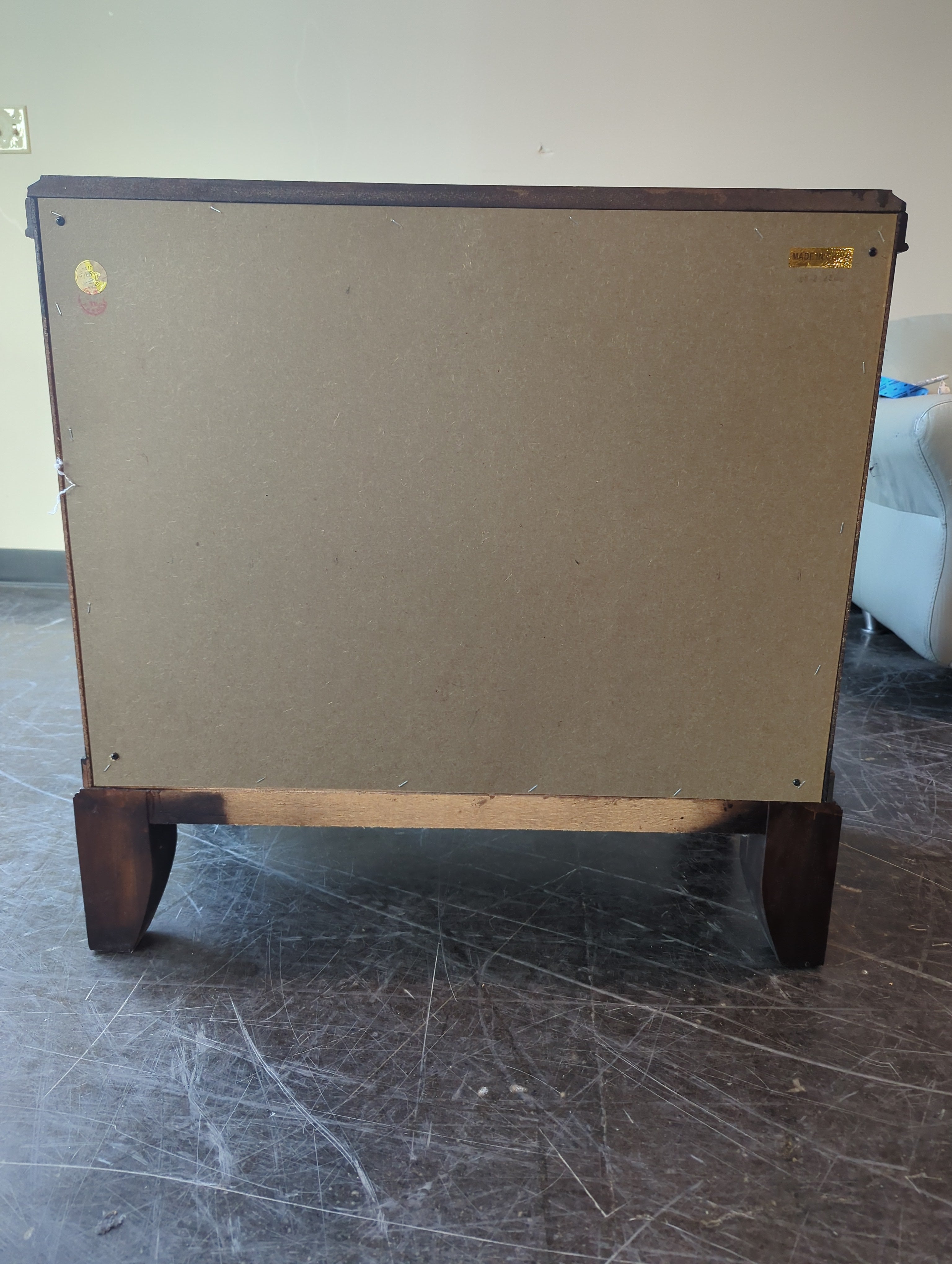 Dark Wood Nightstand with Three Drawers